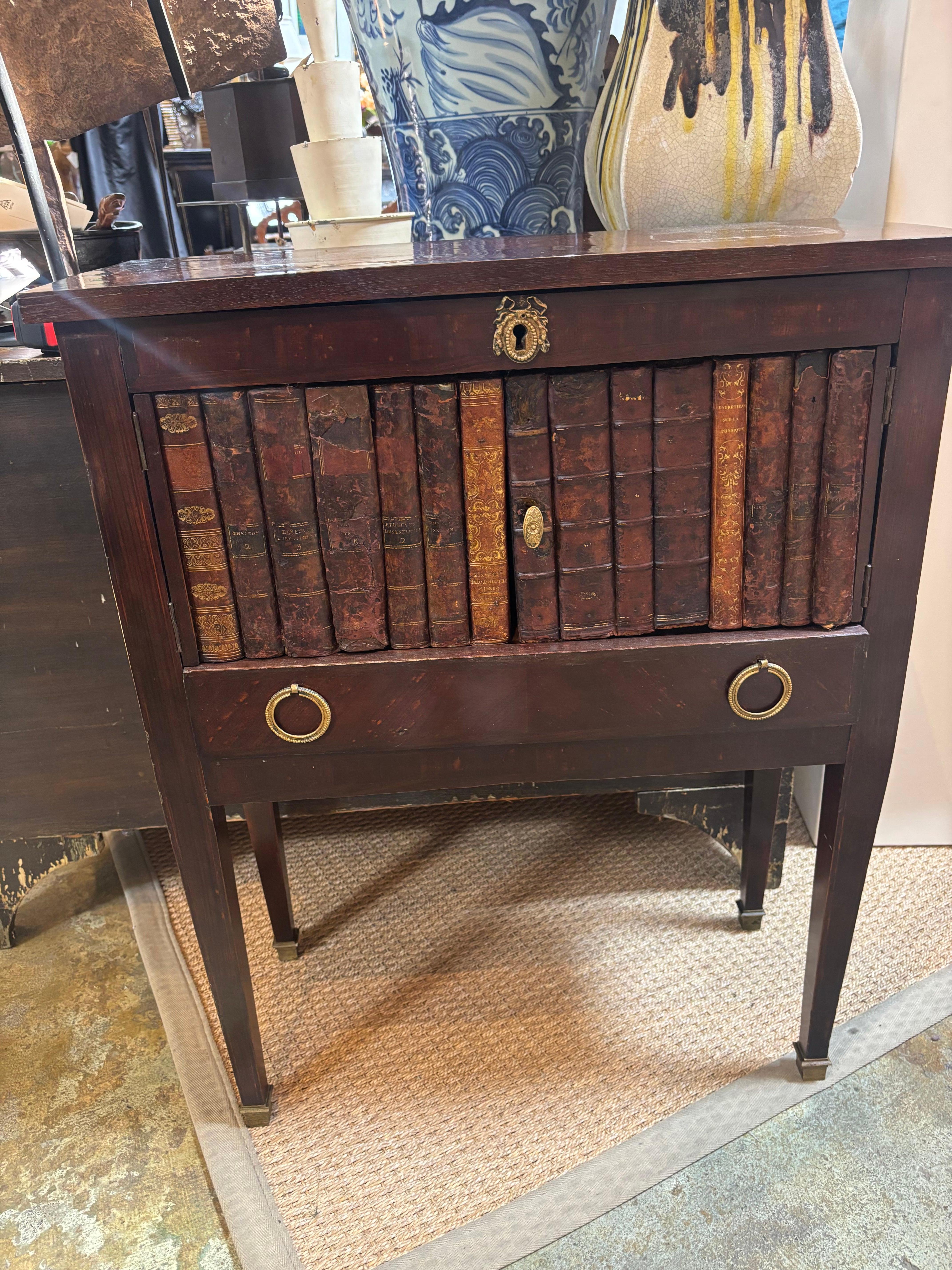 19th Century Faux-Book English Side Table
Antique Charm with Literary Illusion

Add a touch of refined whimsy to your space with this exquisite 19th-century English side table, designed in the clever faux-book style. Crafted to resemble a stack of