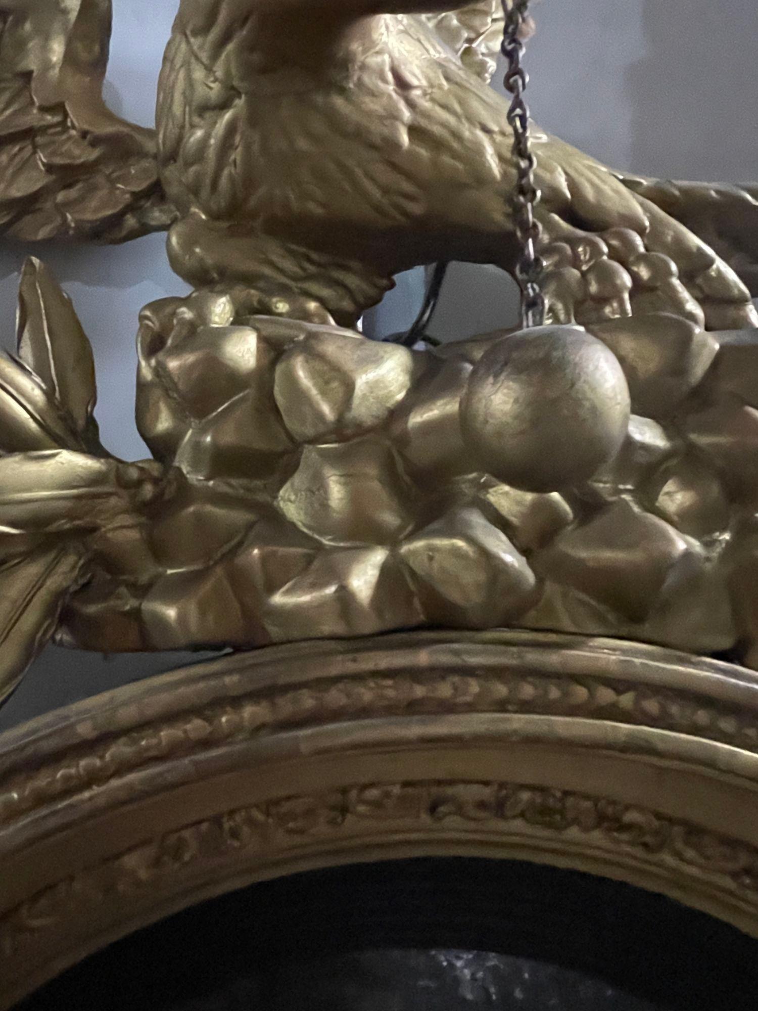 American 19th Century Federal Eagle Bullseye Mirror with Carved Giltwood and Foliate For Sale