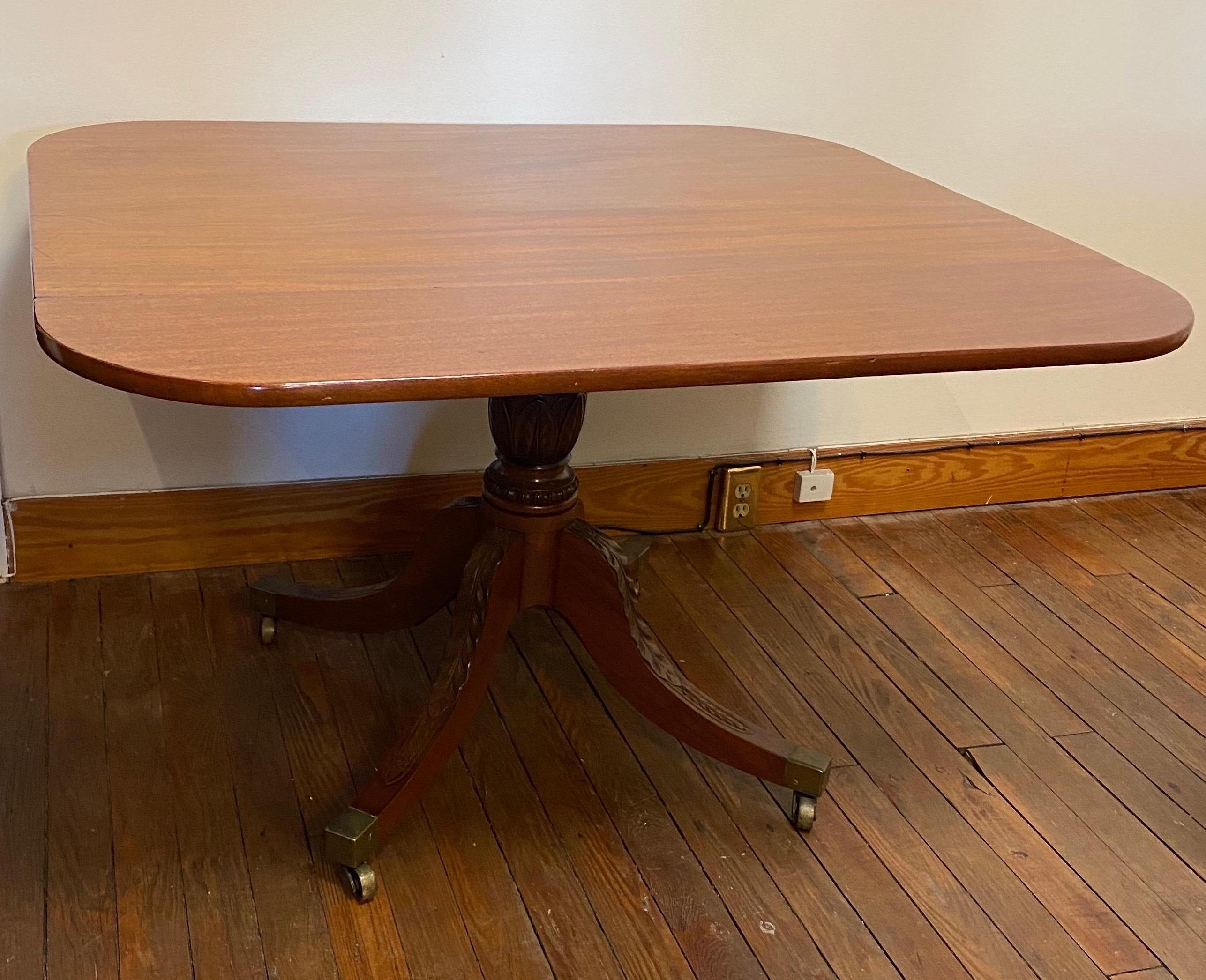 19th century Federal mahogany tilt top breakfast table from Maryland. Wonderfully carved legs and base. Feathered base seen on other pieces from Baltimore and Maryland.