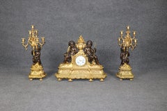 19th C. French Louis XVI Patinated And Ormolu Bronze Clock Set By Millard Paris