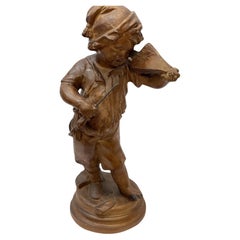 Antique 19th century figure of YoungBoy with musical instrument terra-cotta