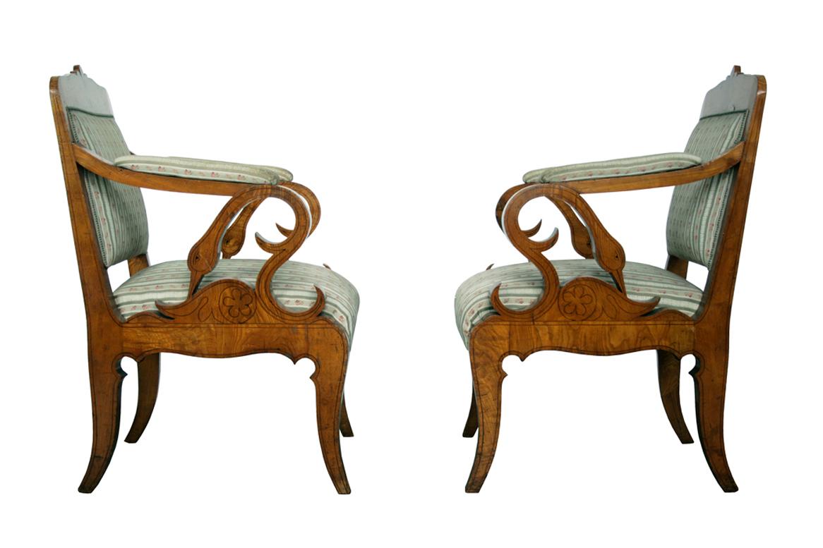 Hello,
This elegant and fine Biedermeier ash wood armchairs were made circa 1825 in Vienna.

Viennese Biedermeier pieces are distinguished by their sophisticated proportions, rare and refined design, excellent craftsmanship and continue to have a