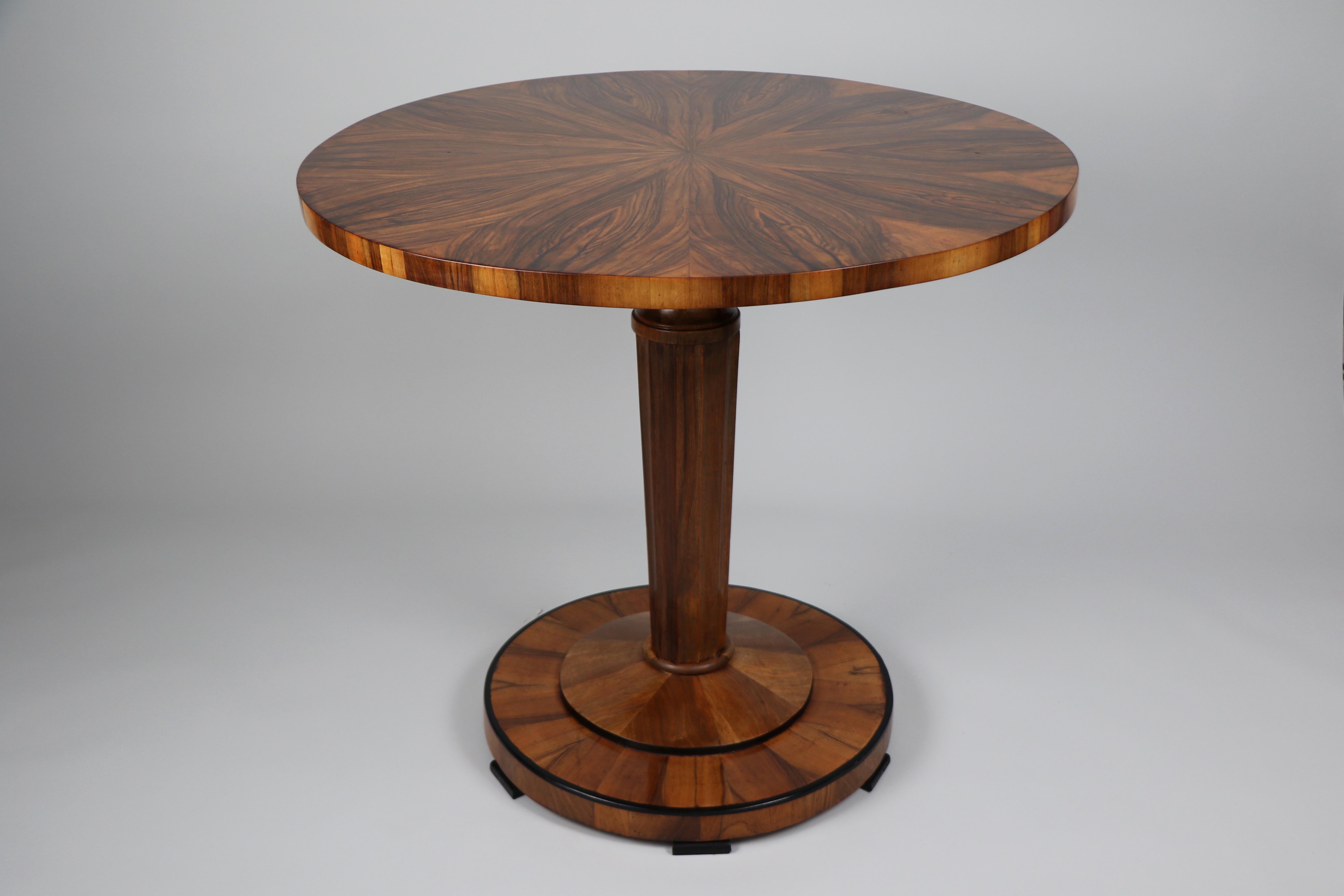 We are pleased to present this exceptional Biedermeier walnut table, crafted in Vienna circa 1825.

Viennese Biedermeier furniture is renowned for its sophisticated proportions, exquisite design, and superb craftsmanship. These pieces are emblematic