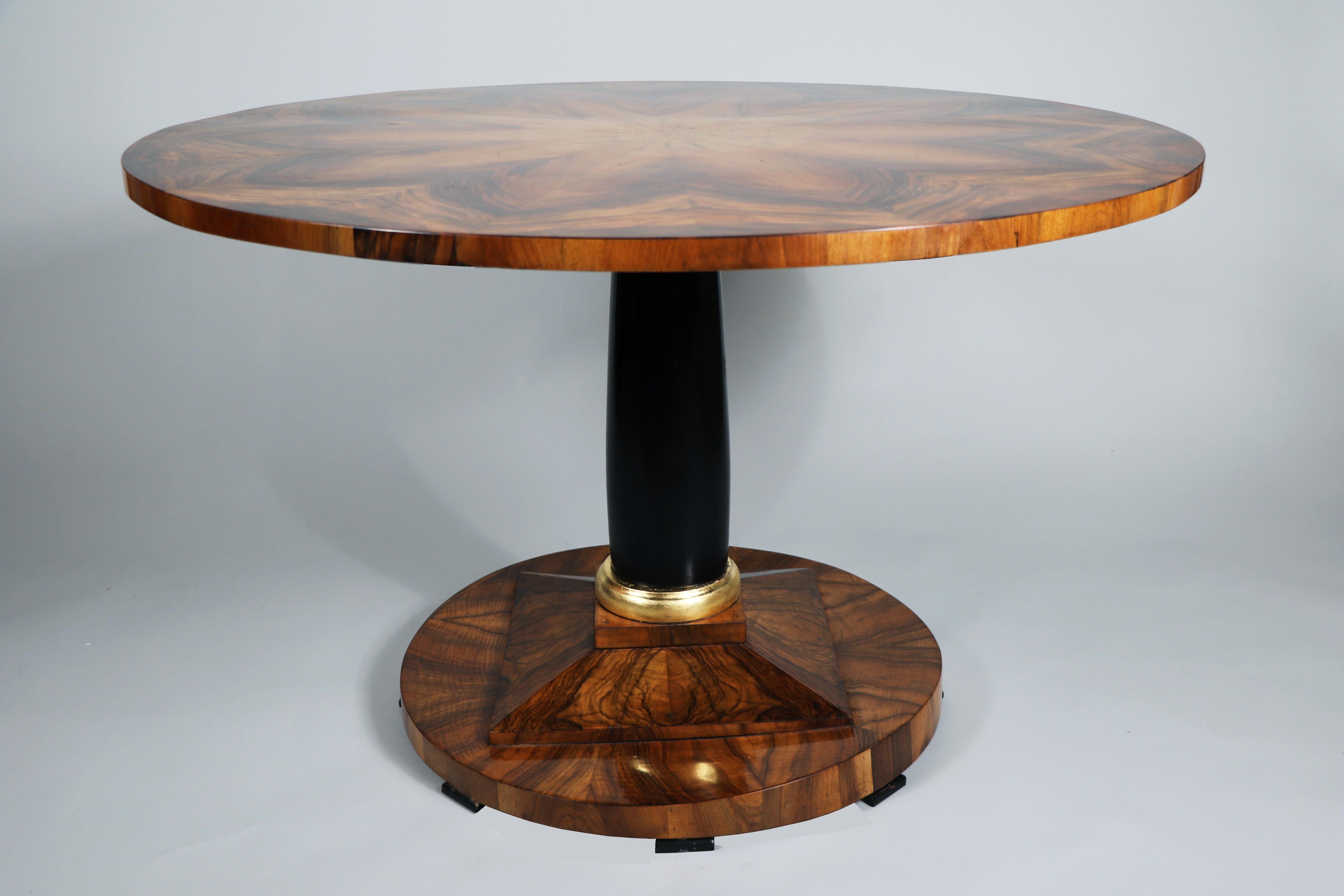 Hello,
This elegant and very rare, large Biedermeier walnut pedestal table is the best example of top-quality Viennese piece from circa 1820-25.

Viennese Biedermeier is distinguished by their sophisticated proportions, rare and refined design and