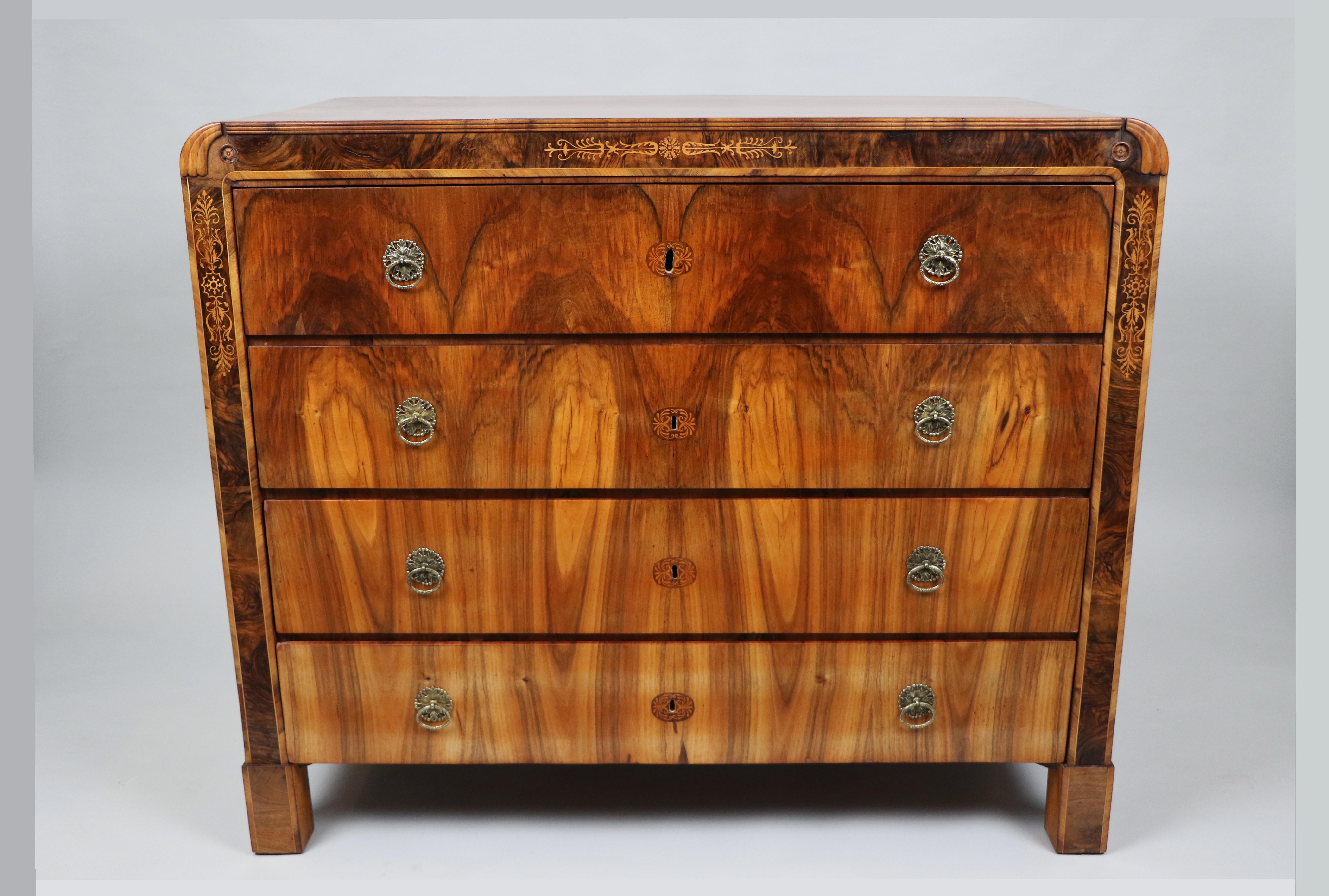 We would like to offer you this truly exquisite, early Biedermeier walnut commode. The piece was made in Vienna circa 1820-25.

Viennese Biedermeier is distinguished by their sophisticated proportions, rare and refined design and excellent