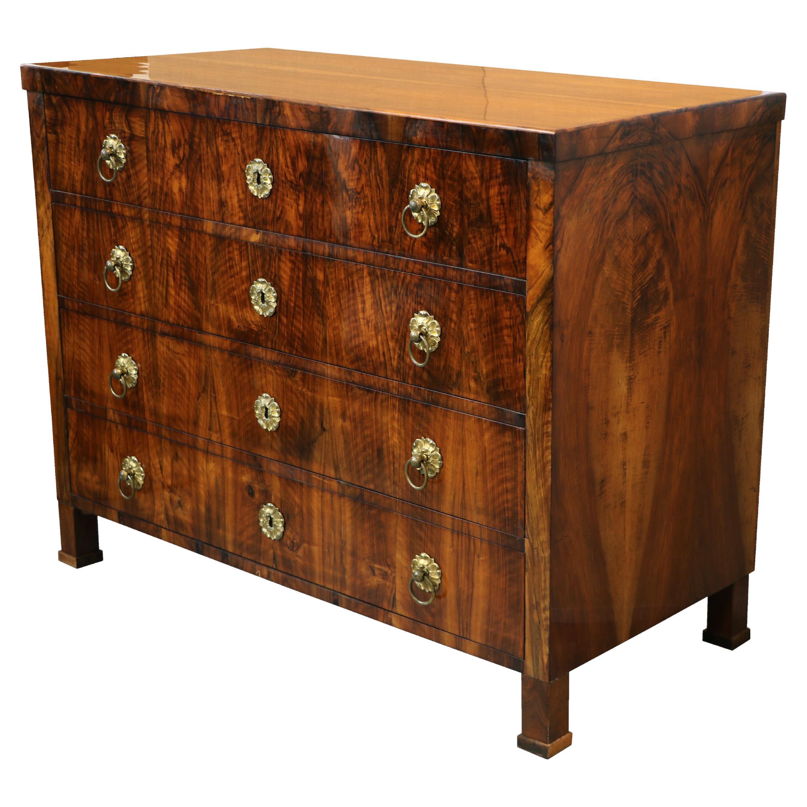 Hello,
We would like to offer you this fine, early Biedermeier walnut chest of four drawers. The piece was made in Vienna circa 1825.

Viennese Biedermeier is distinguished by their sophisticated proportions, rare and refined design and excellent