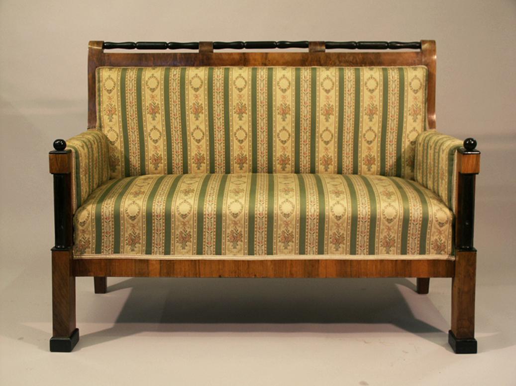 Hello,
This elegant Austrian Biedermeier sofa was made circa 1830.

Austrian Biedermeier pieces are distinguished by their sophisticated proportions, rare and refined design, excellent craftsmanship and continue to have a great influence on modern