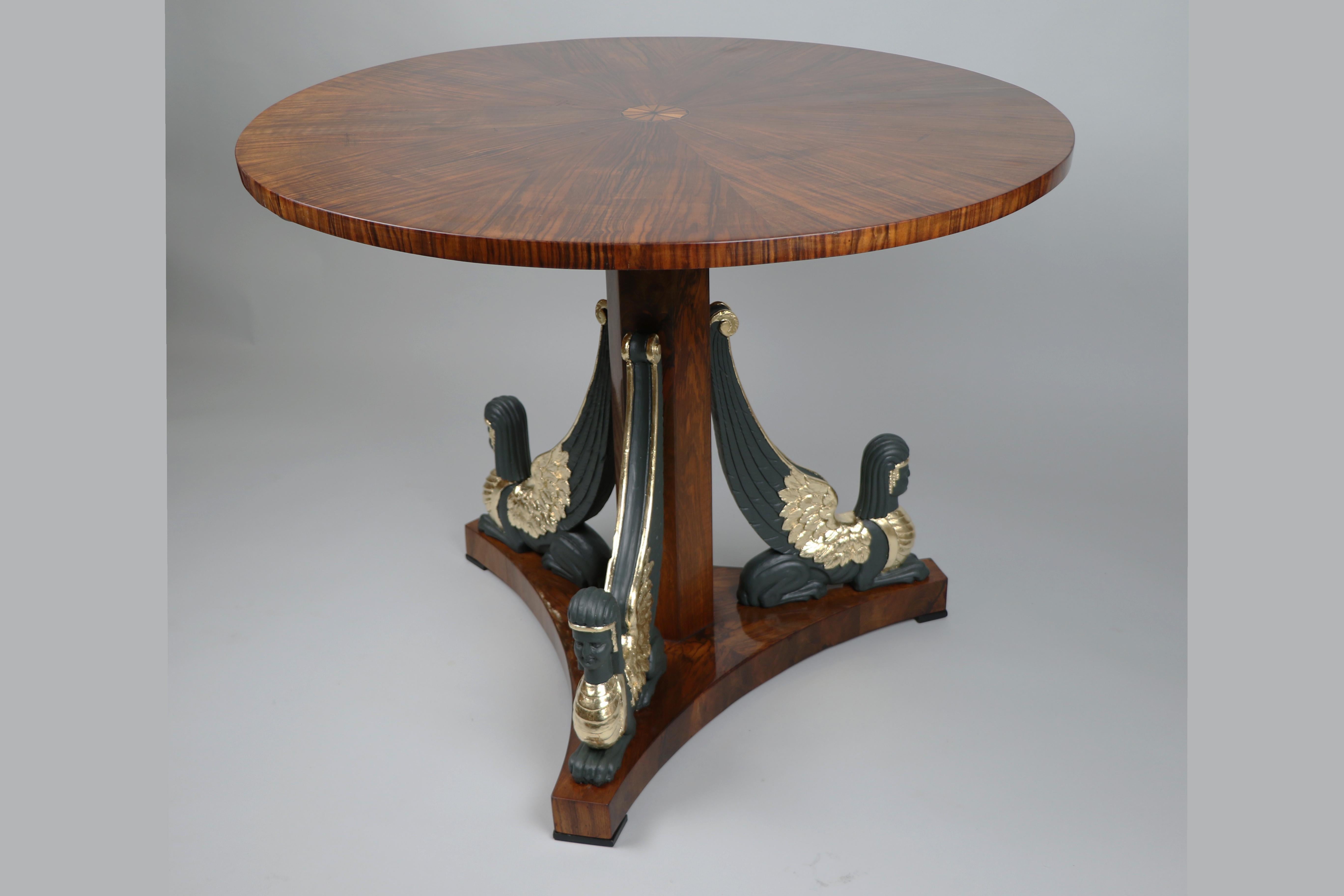 
Hello,
This stunning Biedermeier walnut pedestal table is the best example of top-quality Viennese piece from circa 1820. The table is a gorgeous example of early Biedermeier with Empire style influences.

Viennese Biedermeier is distinguished by