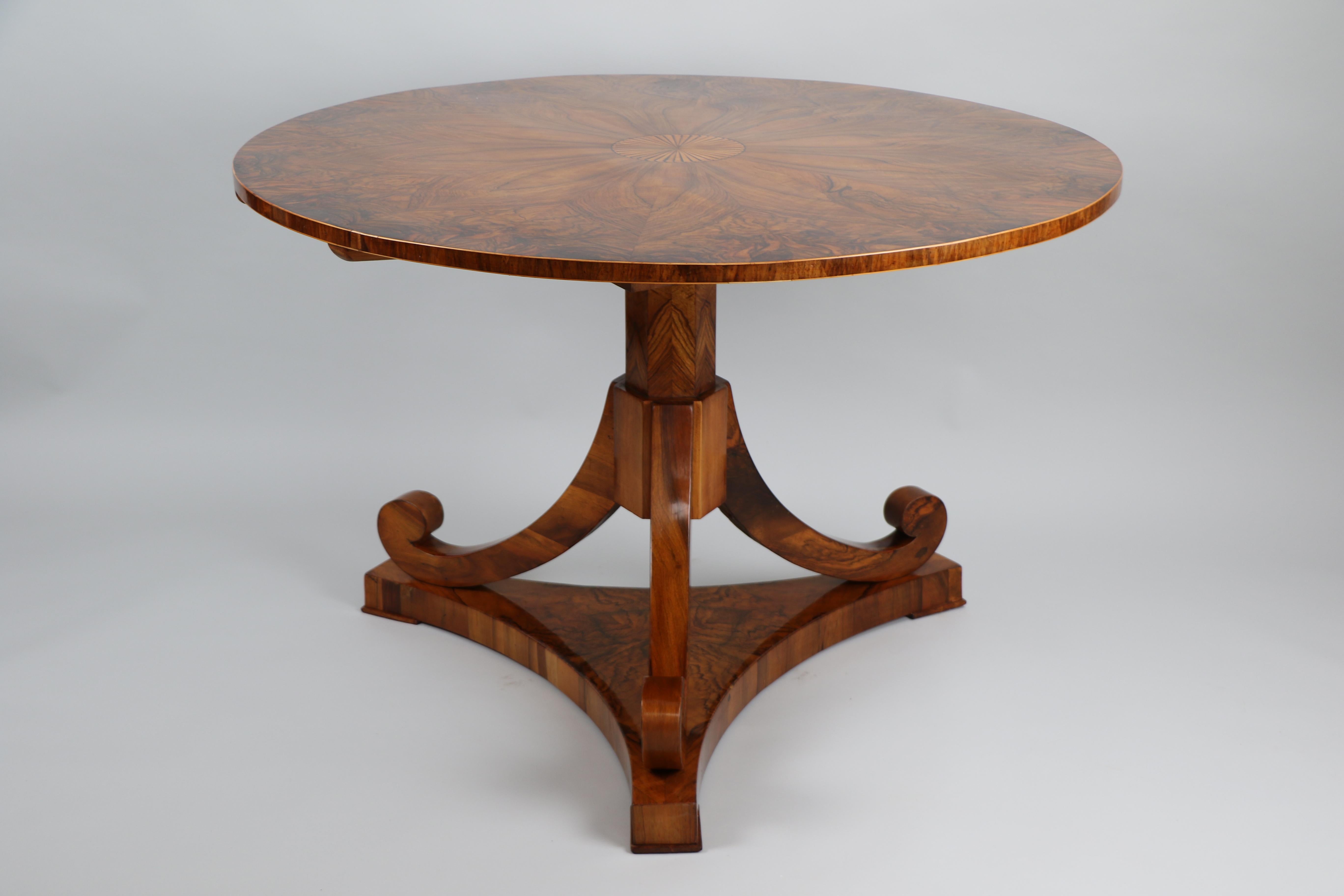 Exceptional Viennese Biedermeier Walnut Pedestal Table, c. 1825

We are pleased to present this exquisite Biedermeier walnut pedestal table — a true masterpiece of early 19th-century Viennese design, dating circa 1825. This rare tilt-top piece