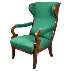 Fauteuil à oreilles en noyer Biedermeier du XIXe siècle. Vienne, vers 1825.