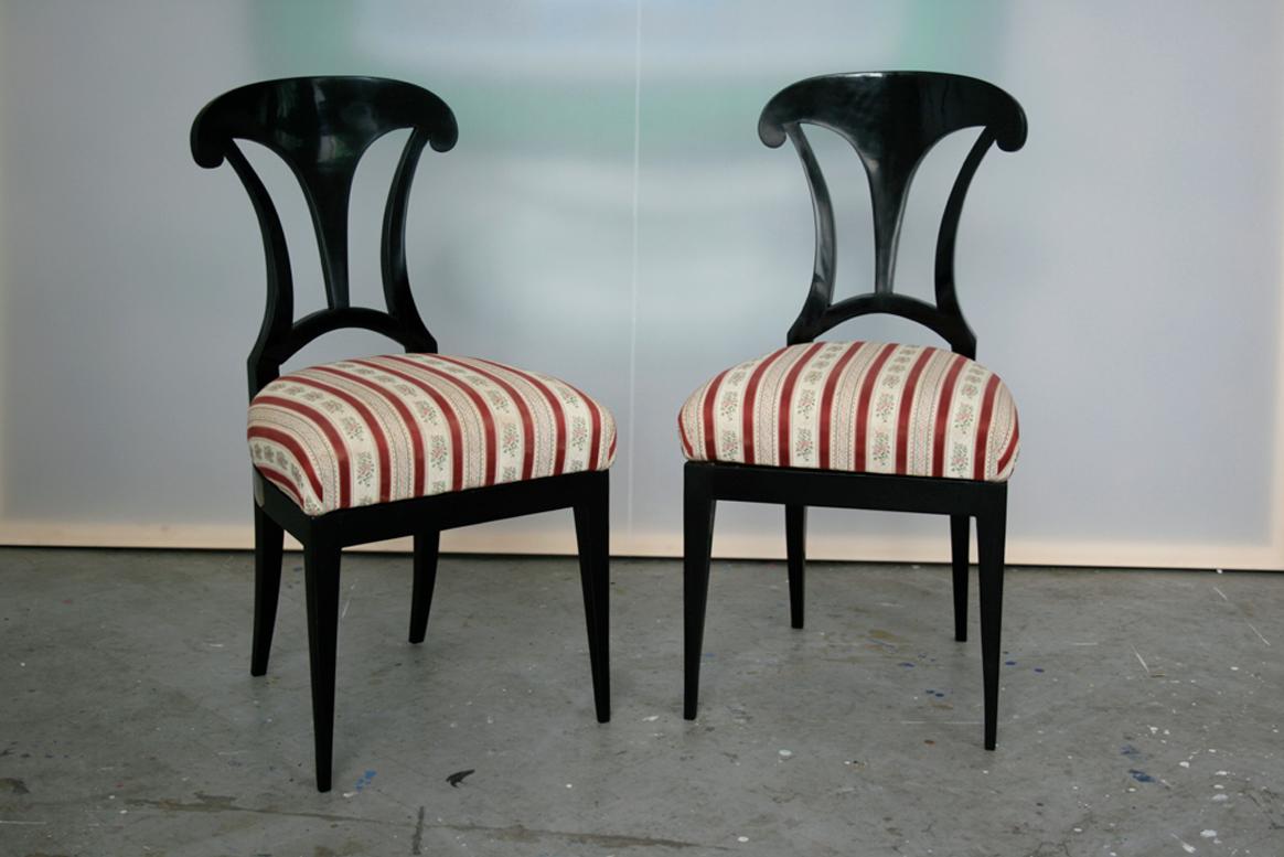 Hello,
This fine two ebonized Viennese Biedermeier chairs were made circa 1825-30.

Ebonized Biedermeier pieces were mostly made in Vienna, Austria and account for only 1-2 % of all Biedermeier furniture made. Therefore, they are very rare.