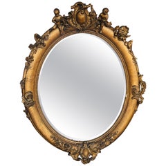 19th Century Fine French Oval Giltwood Mirror with Cherubs on the Top