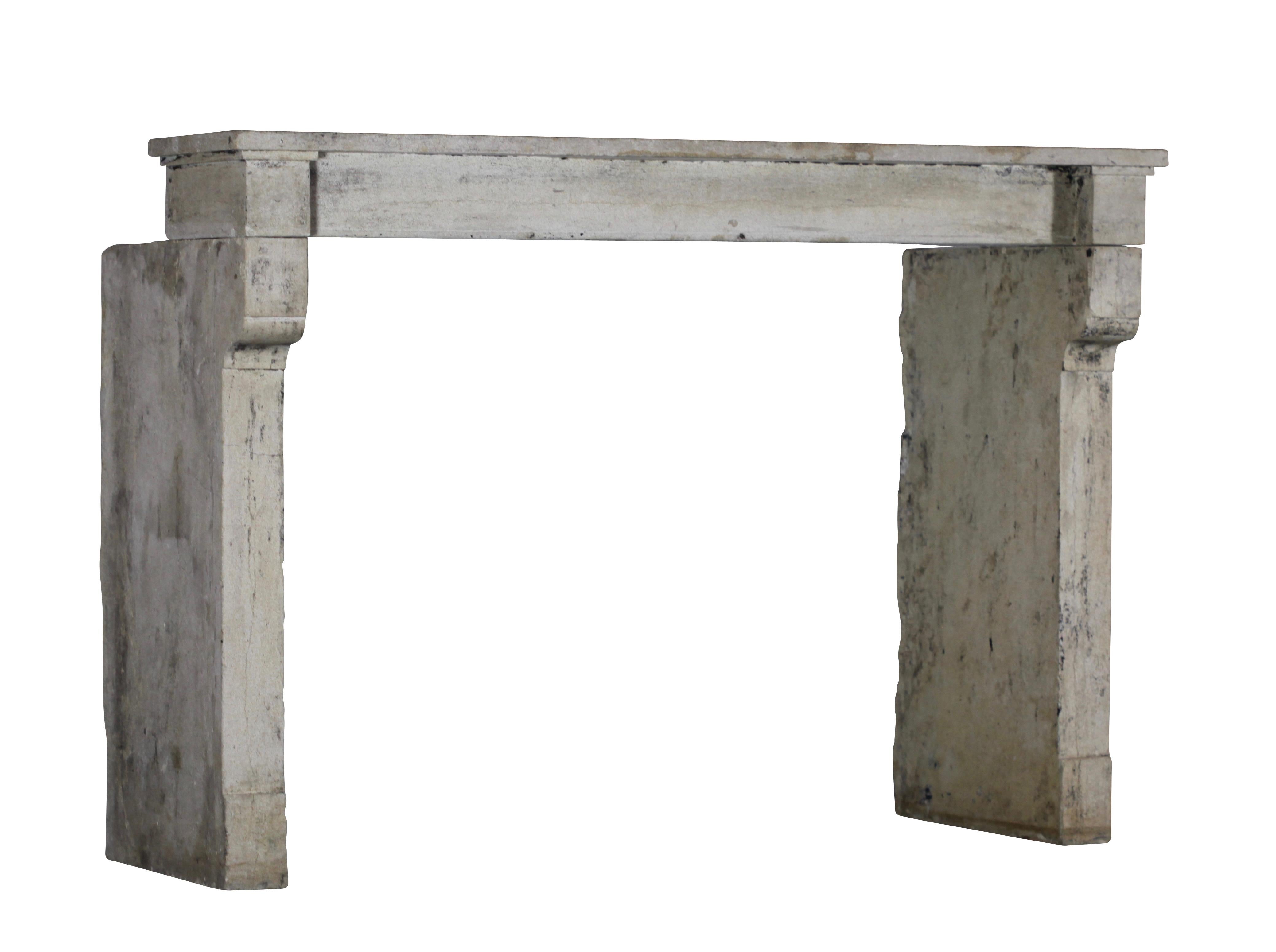 Patinated 19th Century Fine French Rustic Limestone Antique Fireplace Surround For Sale