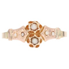 Anillo de oro rosa de 18 quilates con engaste de estrella de perlas finas del siglo XIX