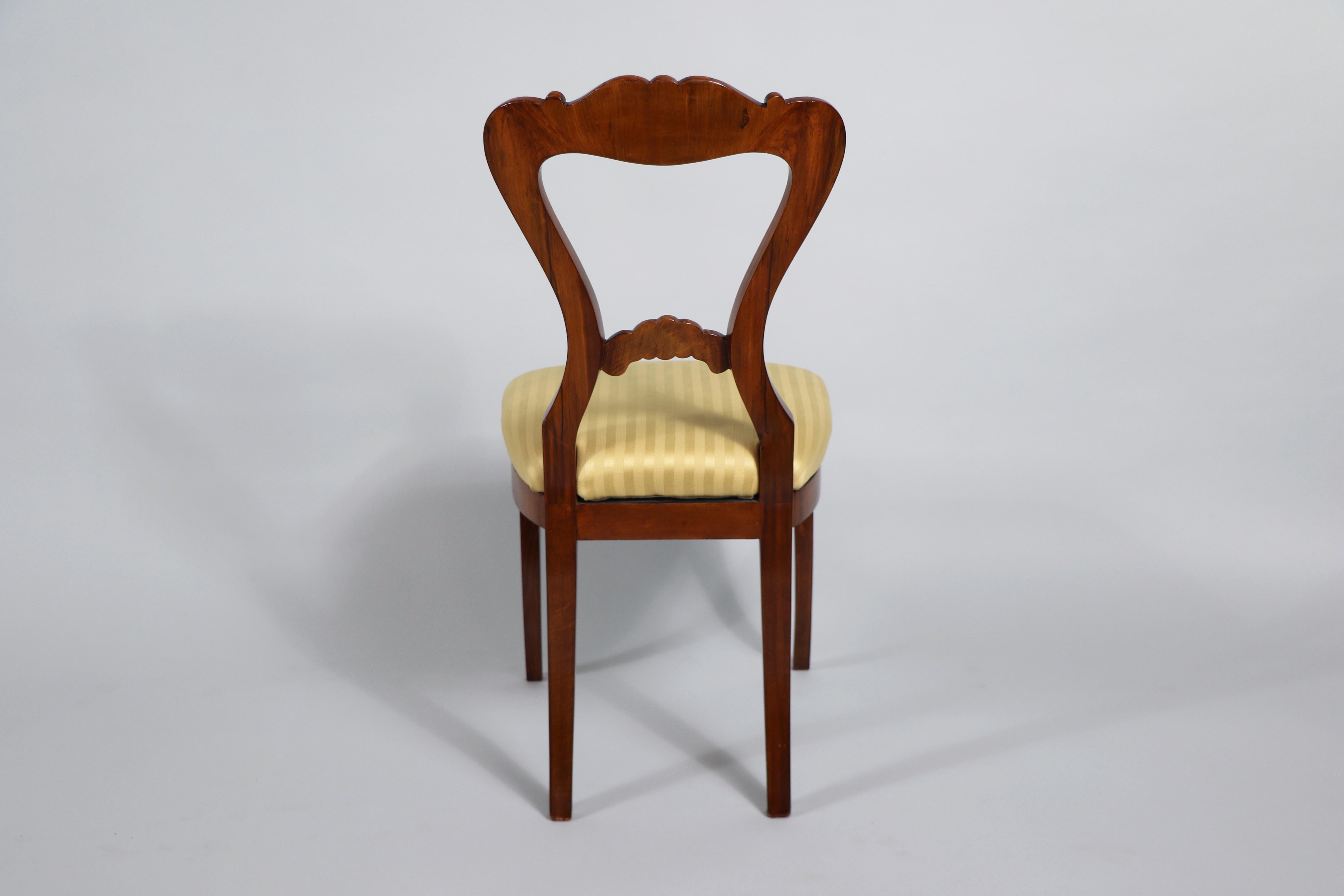 Upholstery 19th Century Set of Four Biedermeier Walnut Chairs. Vienna, c. 1825. For Sale