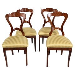 Antique 19th Century Set of Four Biedermeier Walnut Chairs. Vienna, c. 1825.