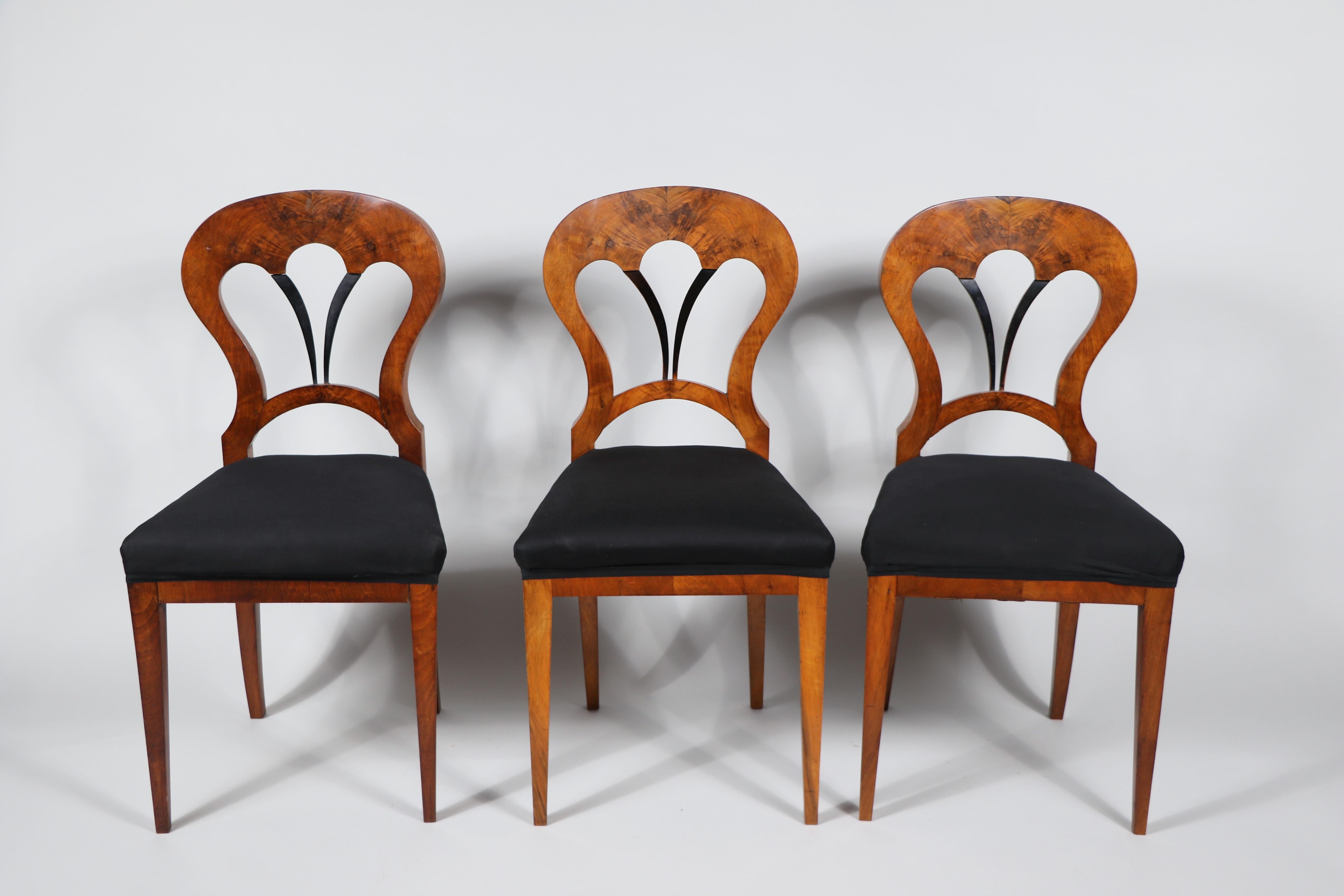 Hello,
These fine set of six Viennese Biedermeier walnut chairs from circa 1825 is the best example of an early Viennese Biedermeier which reflect innovative design and highest quality craftsmanship.

Viennese Biedermeier pieces are distinguished by