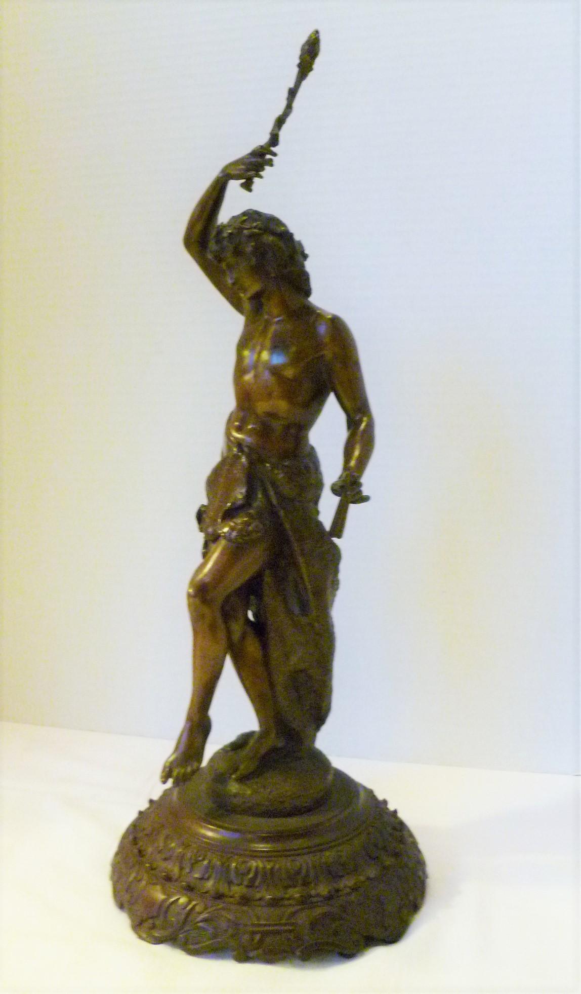 Extremely detailed and finely chased 19th century bronze figure of pan in celebration or dance perhaps in Bacchanalia. Flutes, laurel scepter raised, lion skin cloak, floral head garland and exquisite detail highlight this statue. Intricate carved