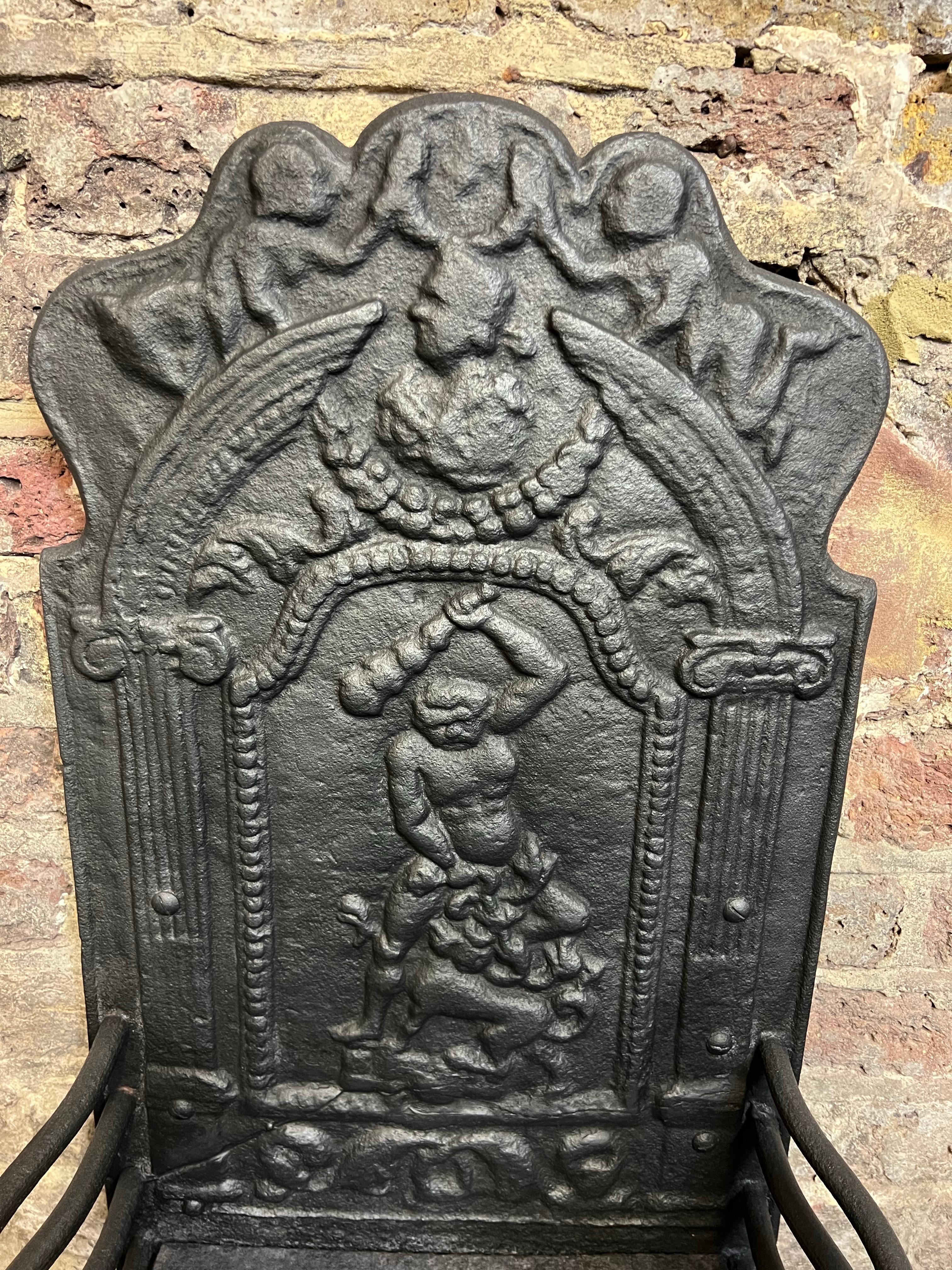 19th Century Fireplace Basket High Back Grate.
Original Georgian Fireplace Dog Grate. 
With Decorative Cast Iorn Fireback & Ball Dogs.
Blackened Finish. 
Recently Salvaged From A London Town House.

Dimensions;

Height Of Fire Back 29