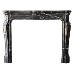 19th century fireplace in style of Pompadour of Nero Marquina marble