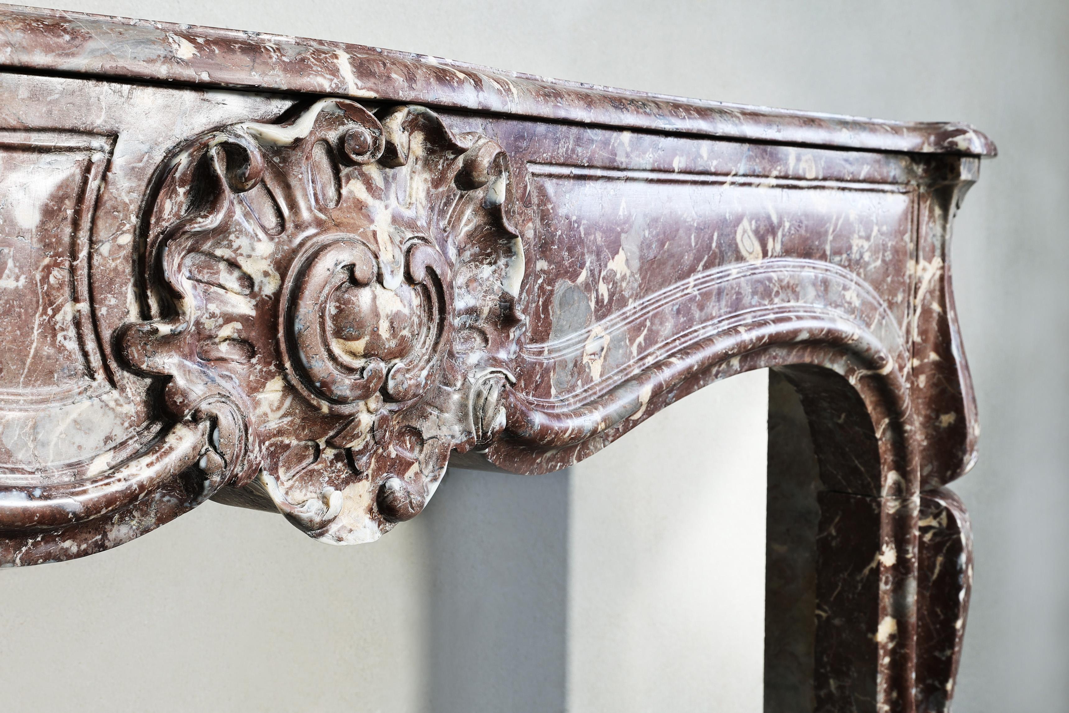 19th century fireplace made of Rouge Royal marble in the style of Louis XV  For Sale 1