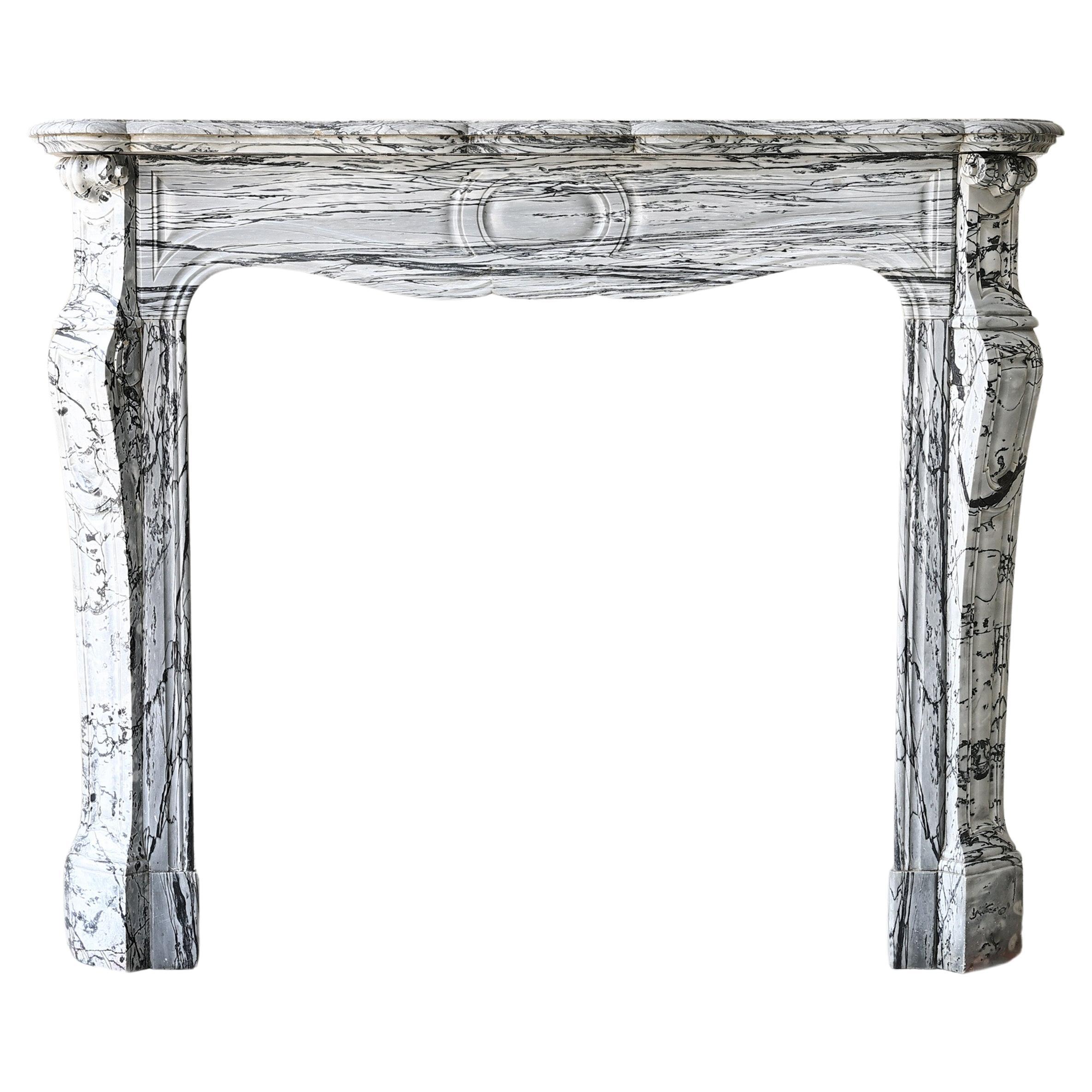 19th century fireplace of blue fleuri marble in Pompadour style For Sale