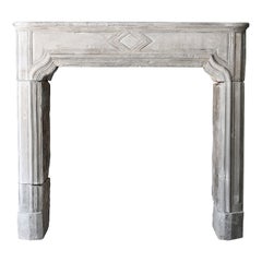 Antique 19th Century Fireplace of French limestone in Style of Louis XVI