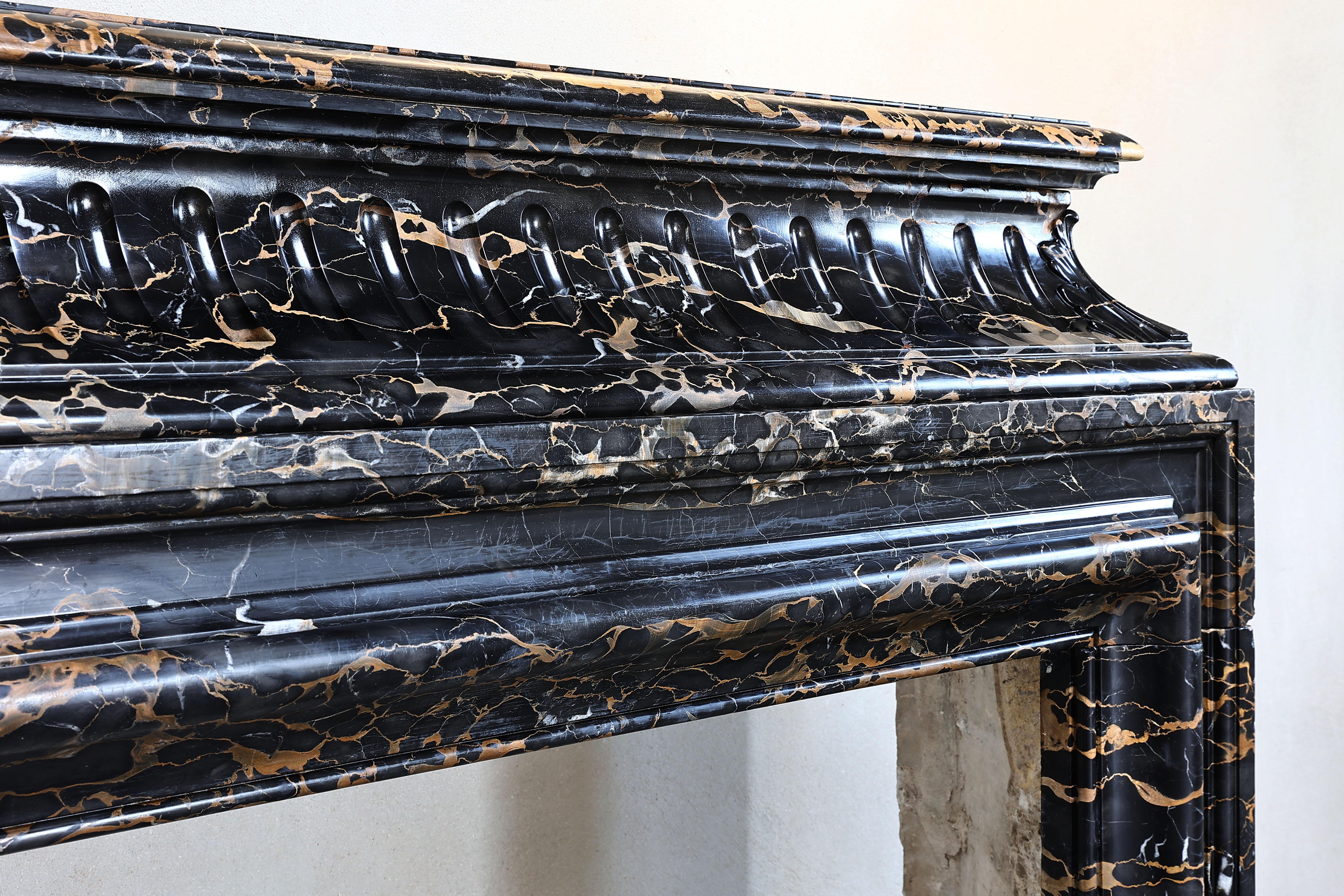 Belgian 19th Century Fireplace of Portoro Marble in Style of Louis XVI For Sale