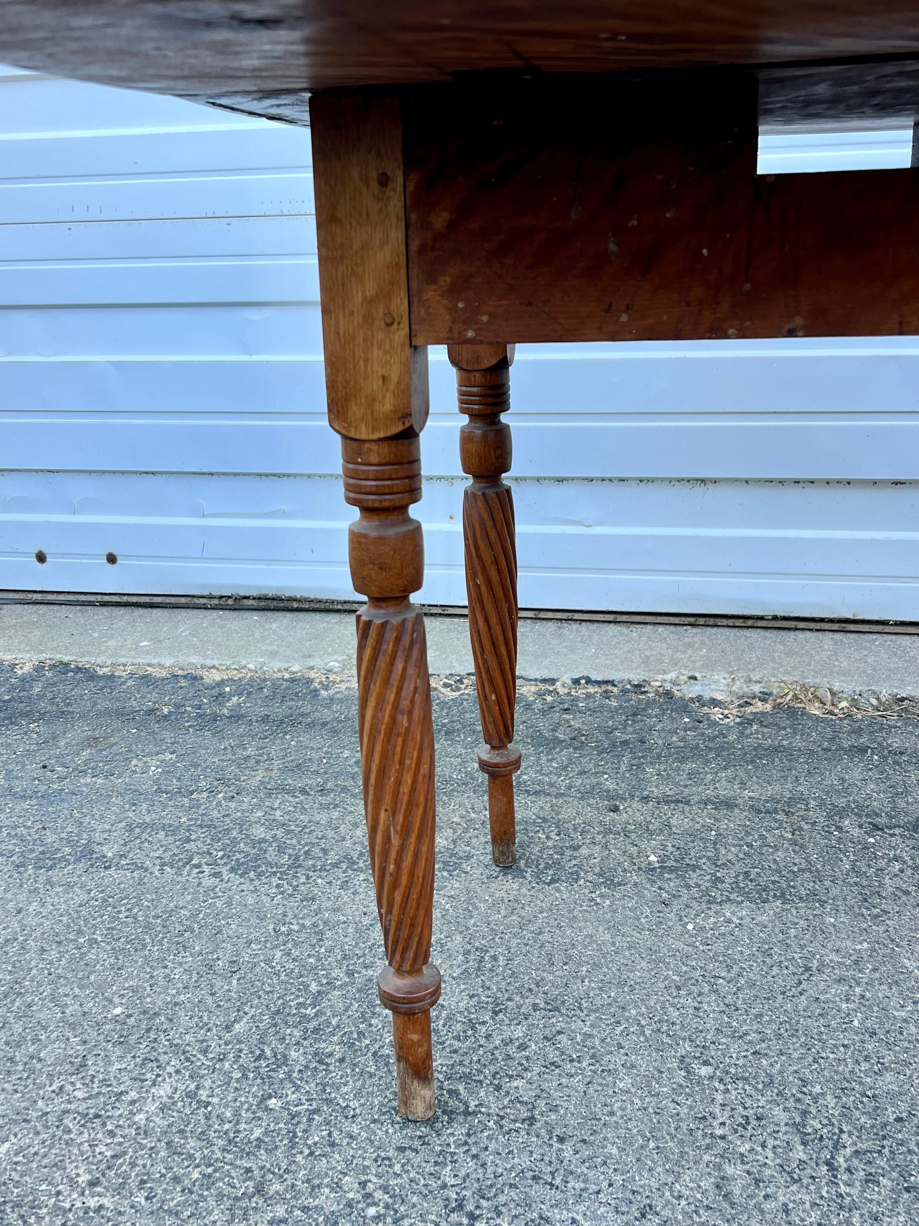 North American 19th Century Flame Birch Drop Leaf Table with Spiral Carved Legs For Sale