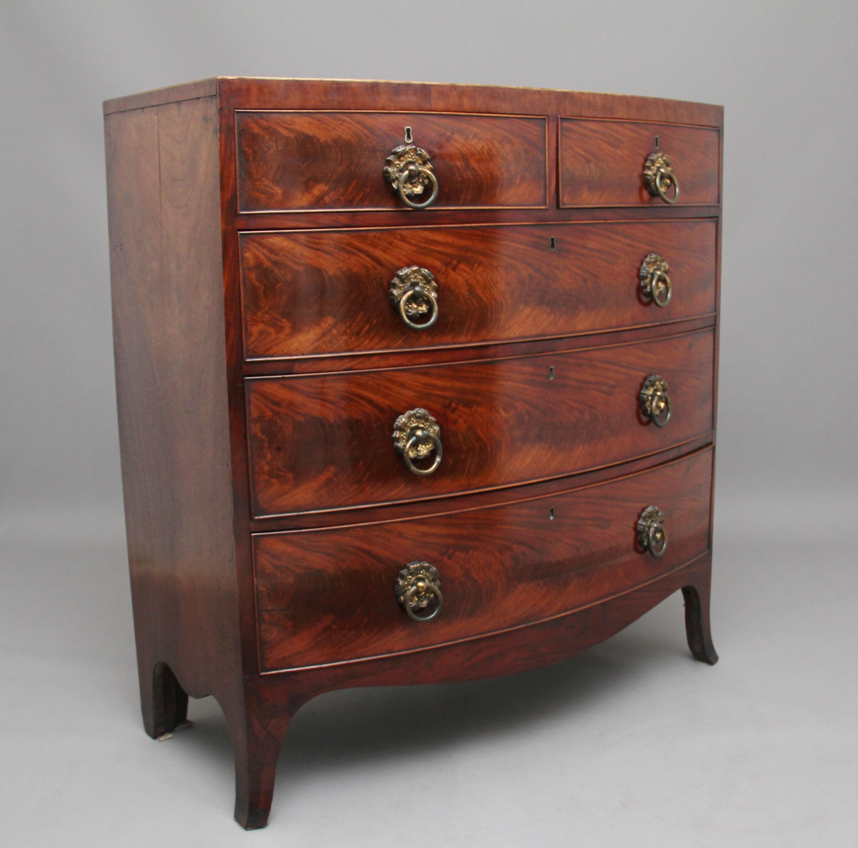 A superb quality early 19th century flame mahogany bowfront chest of drawers, having a nice figured top above a selection of two short over three long graduated drawers, with original engraved brass plate and ring handles, having wonderful flame