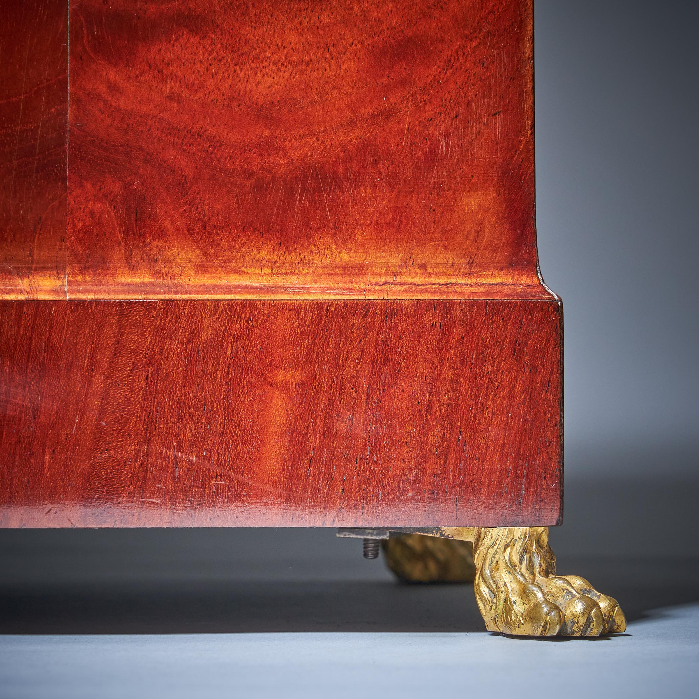 Empire 19th-Century Flame Mahogany Mantel Clock by Breguet Raised by Lion Paw Feet For Sale