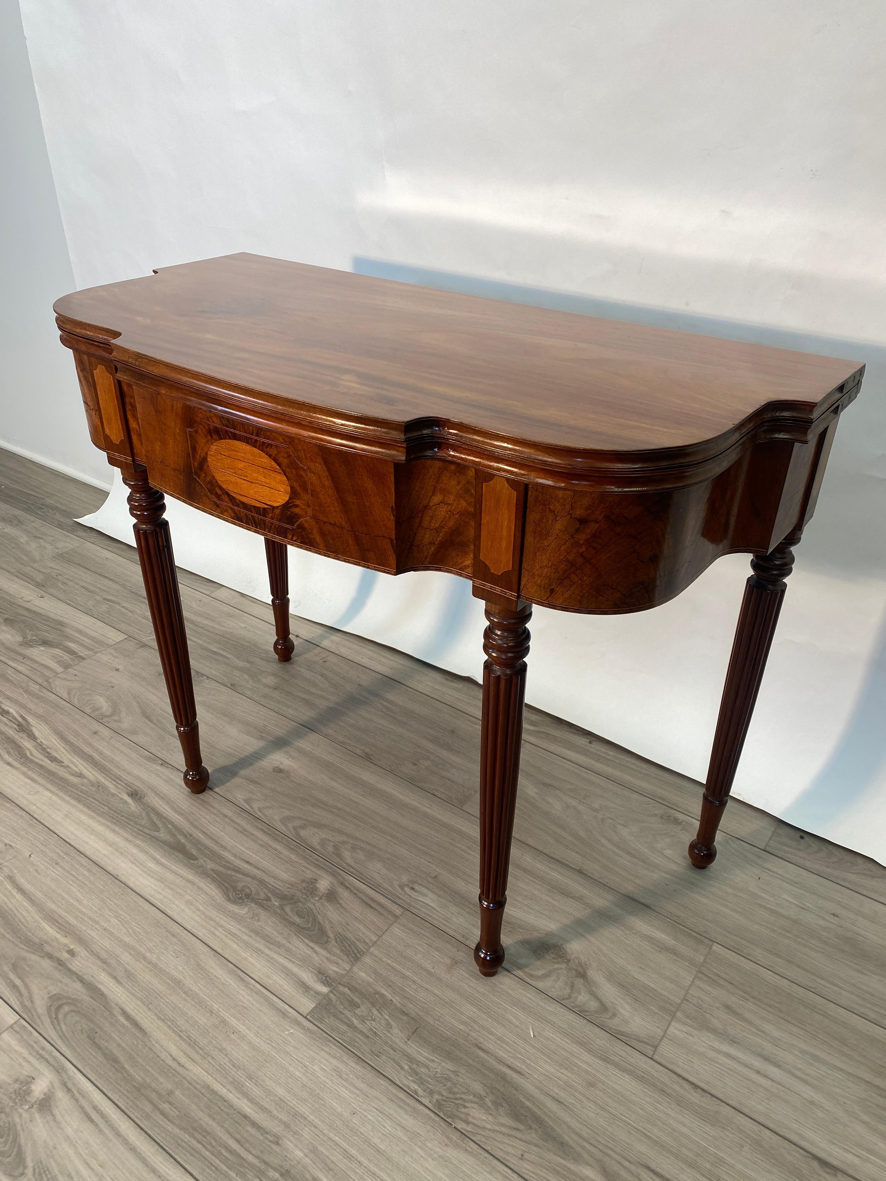 Polished 19th Century Flamed Mahogany Flip Top Sheraton Style Side Table For Sale