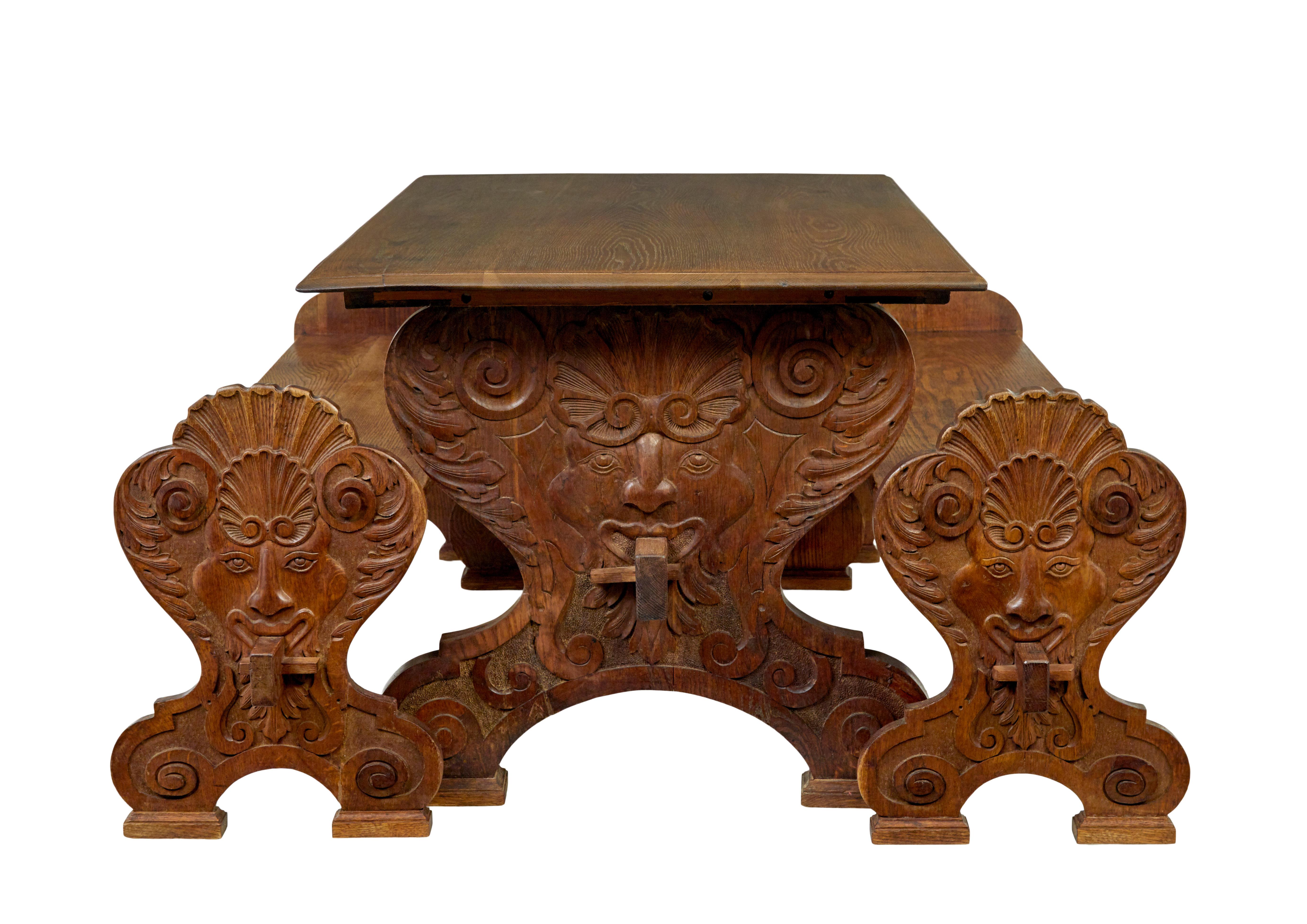 Gothic Revival 19th century Flemish carved oak green man dining table and benches