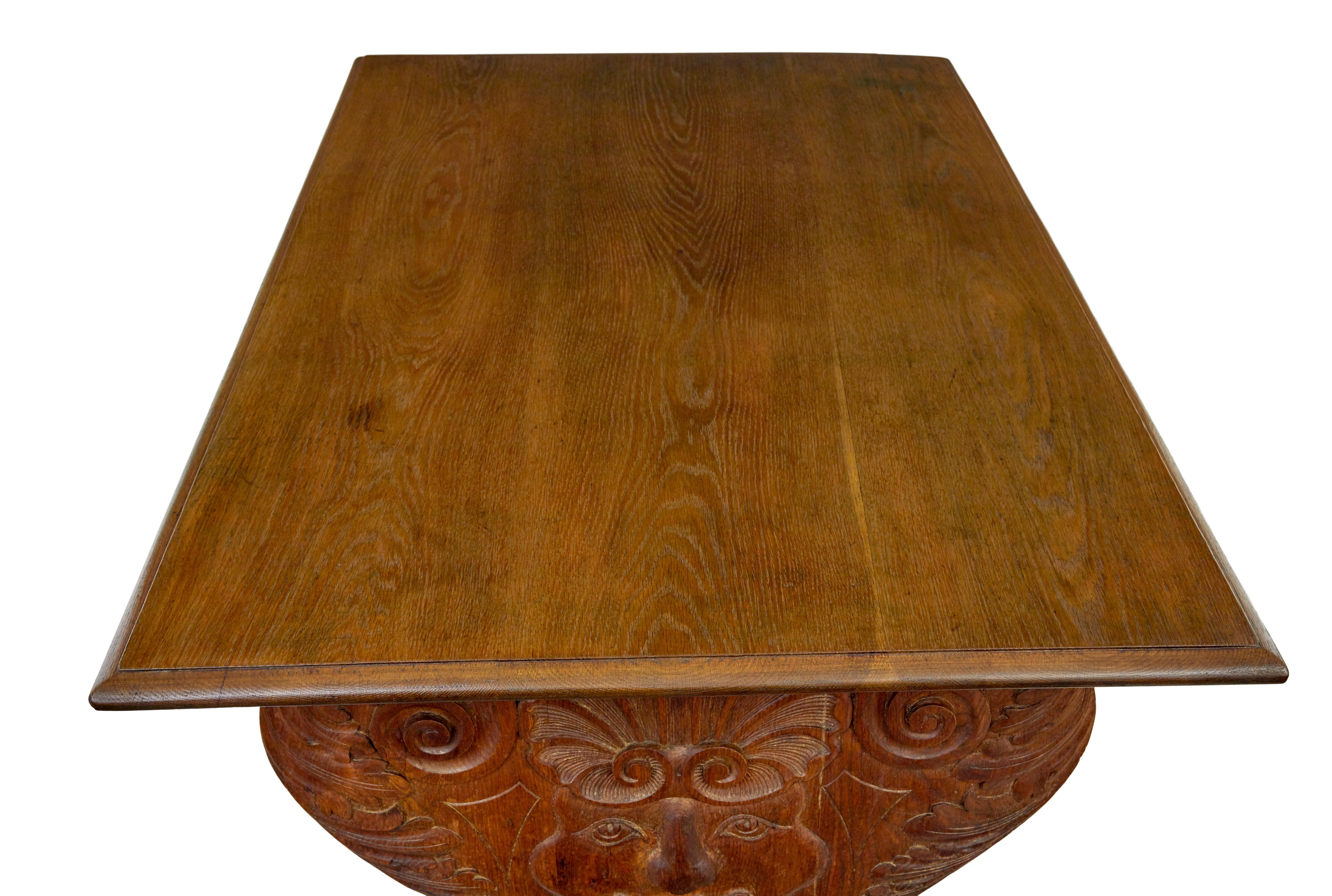 19th century Flemish carved oak green man dining table and benches In Good Condition In Debenham, Suffolk