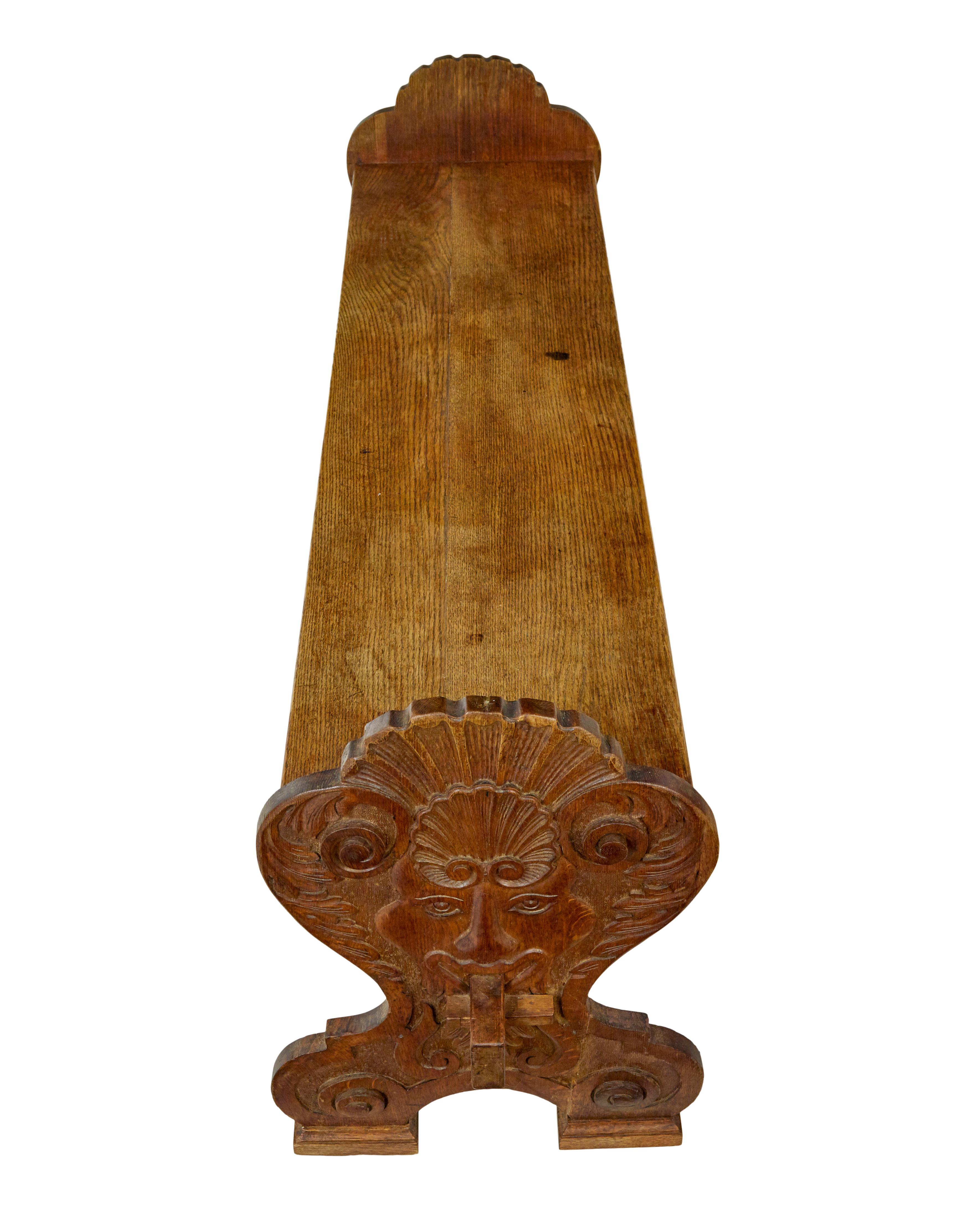 Oak 19th century Flemish carved oak green man dining table and benches