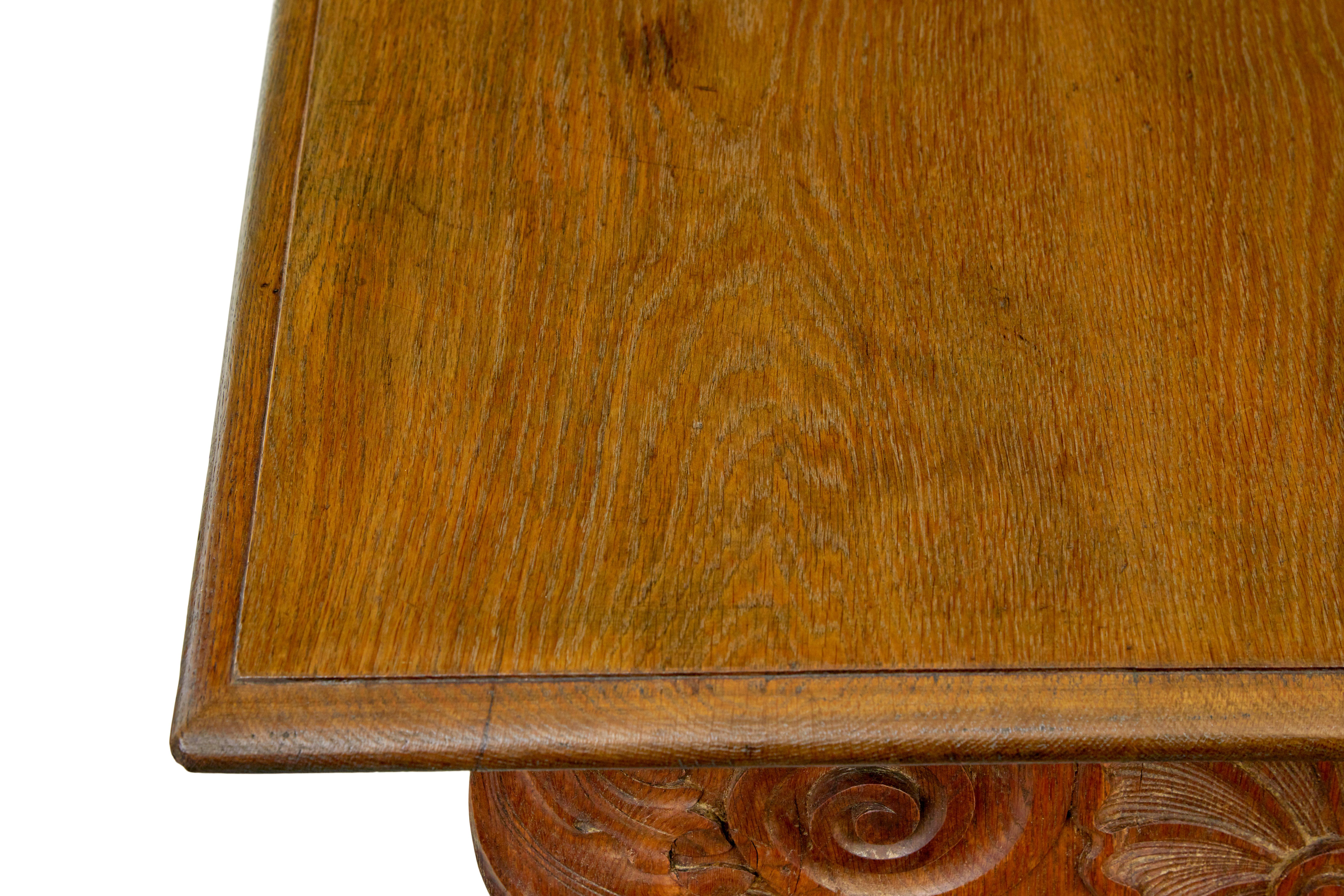19th century Flemish carved oak green man dining table and benches 1