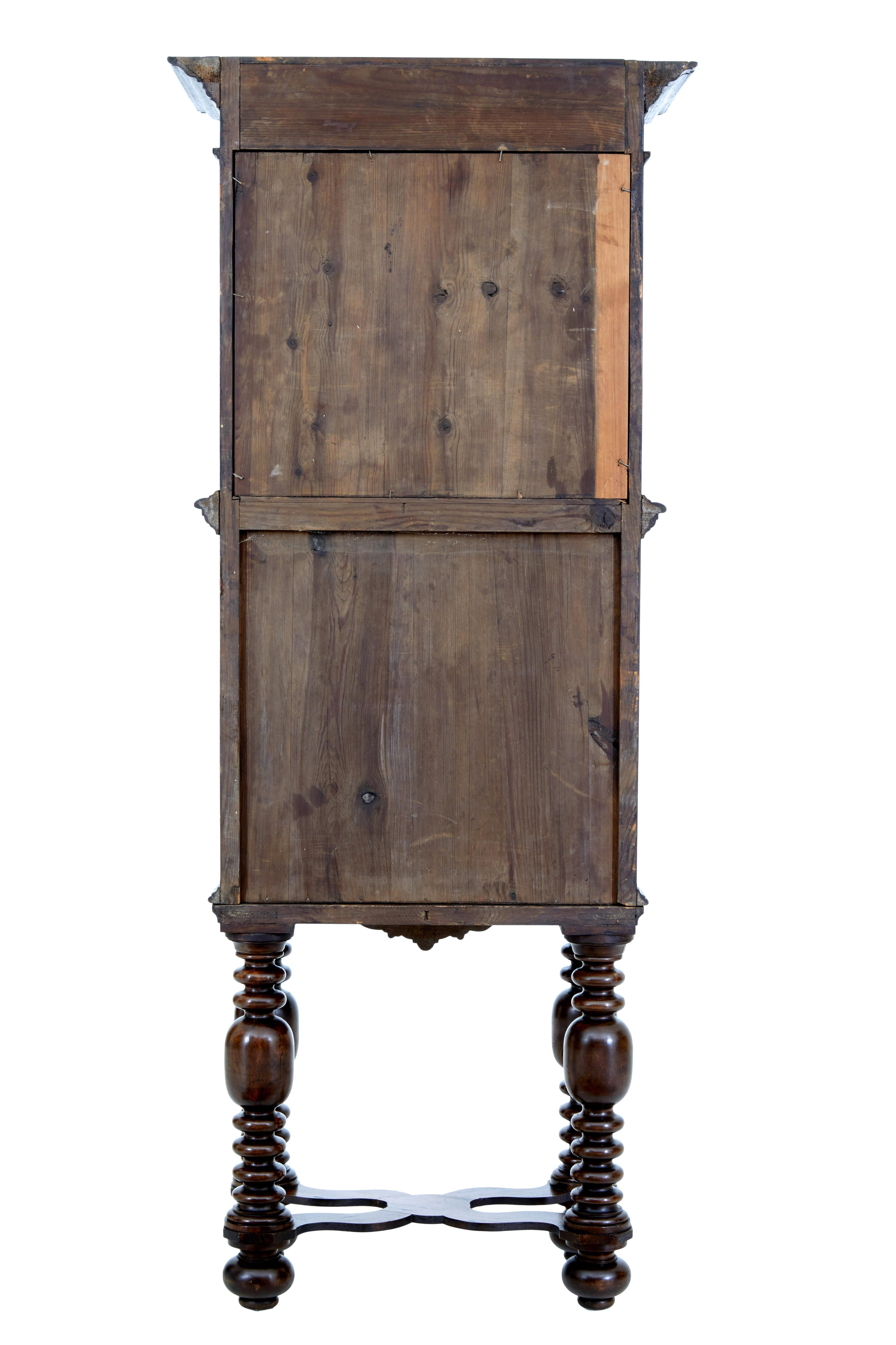 Carved 19th century Flemish carved oak hall cupboard on stand For Sale
