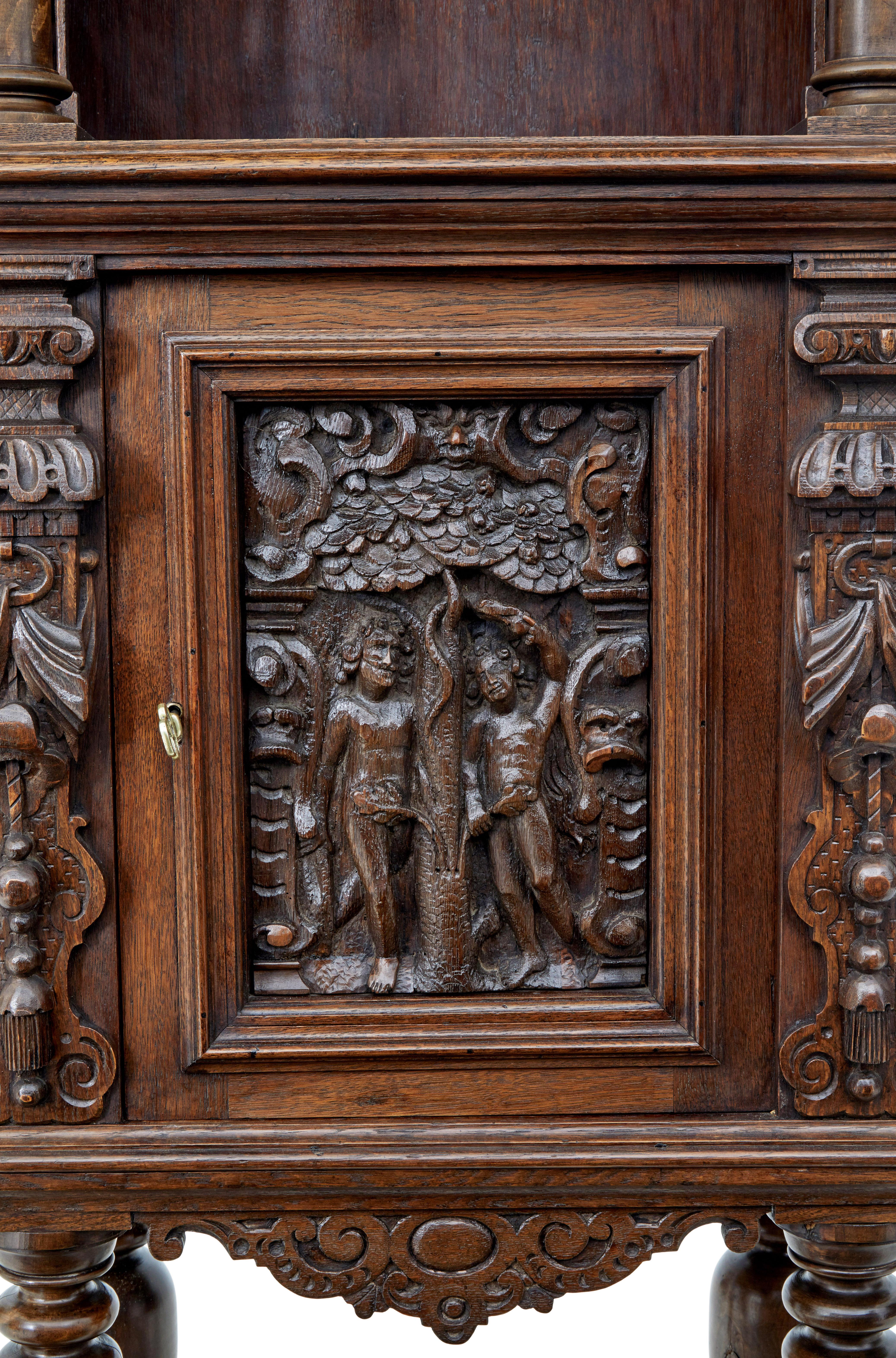 19th Century 19th century Flemish carved oak hall cupboard on stand For Sale