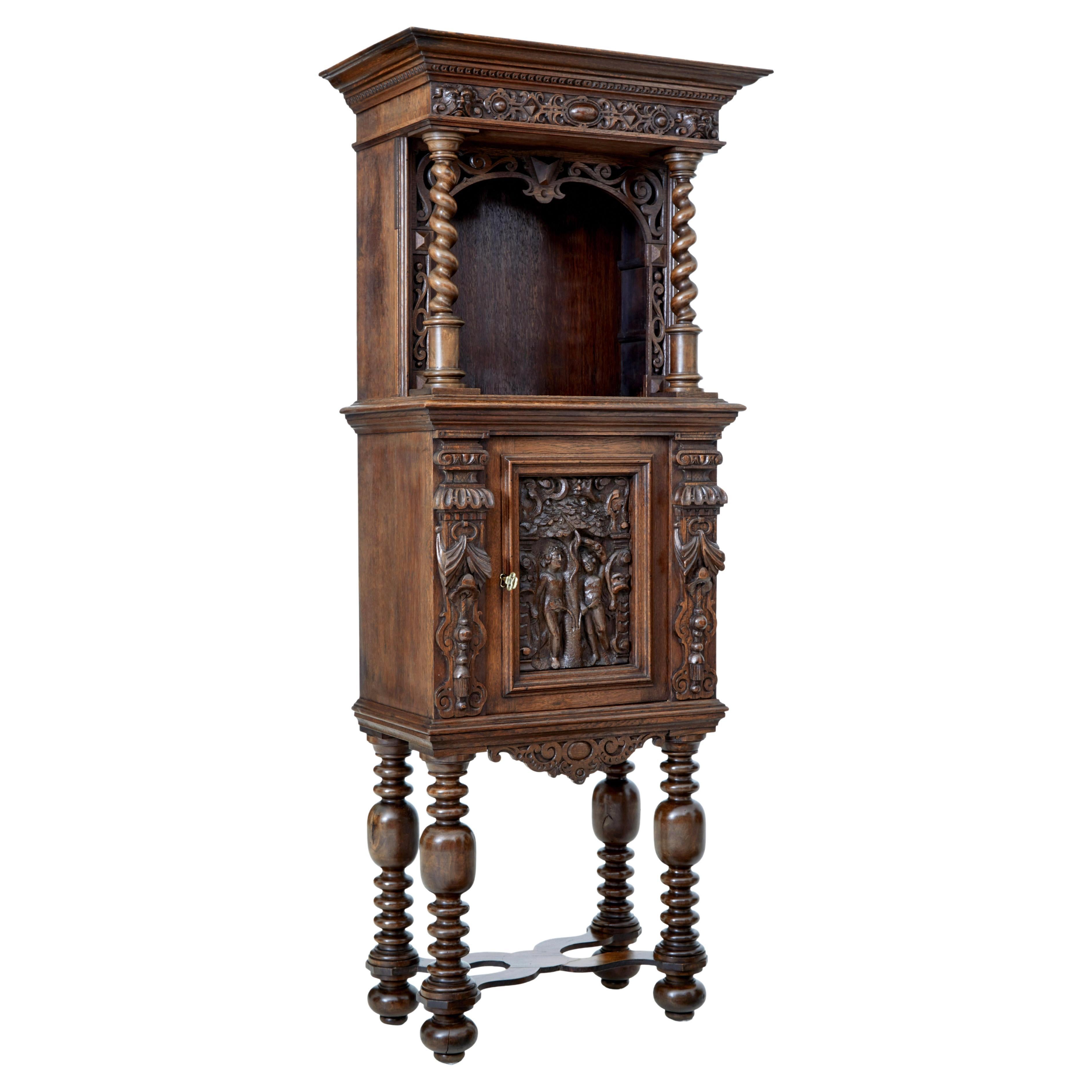 19th century Flemish carved oak hall cupboard on stand For Sale