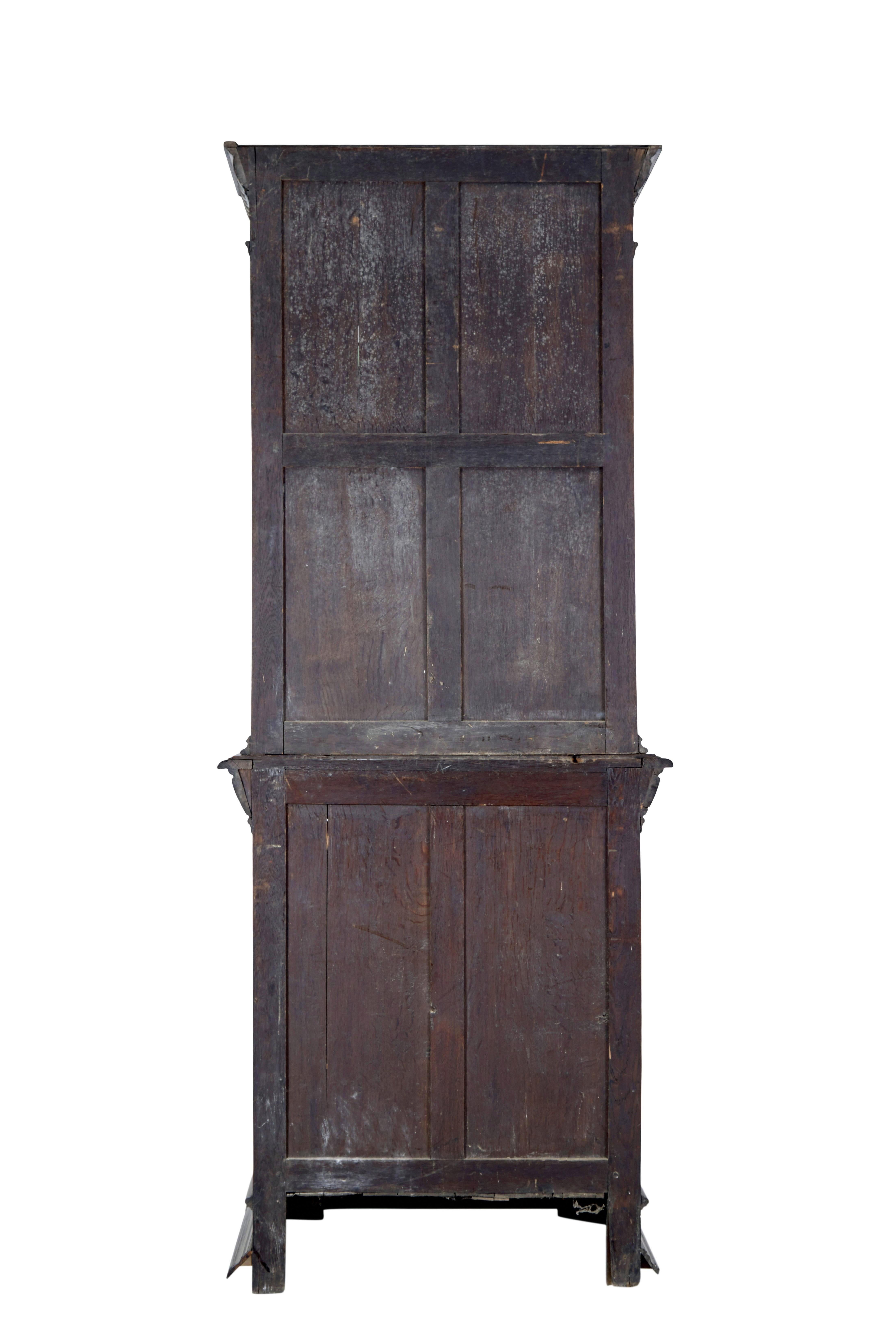 Carved 19th century Flemish oak and stain glass cabinet