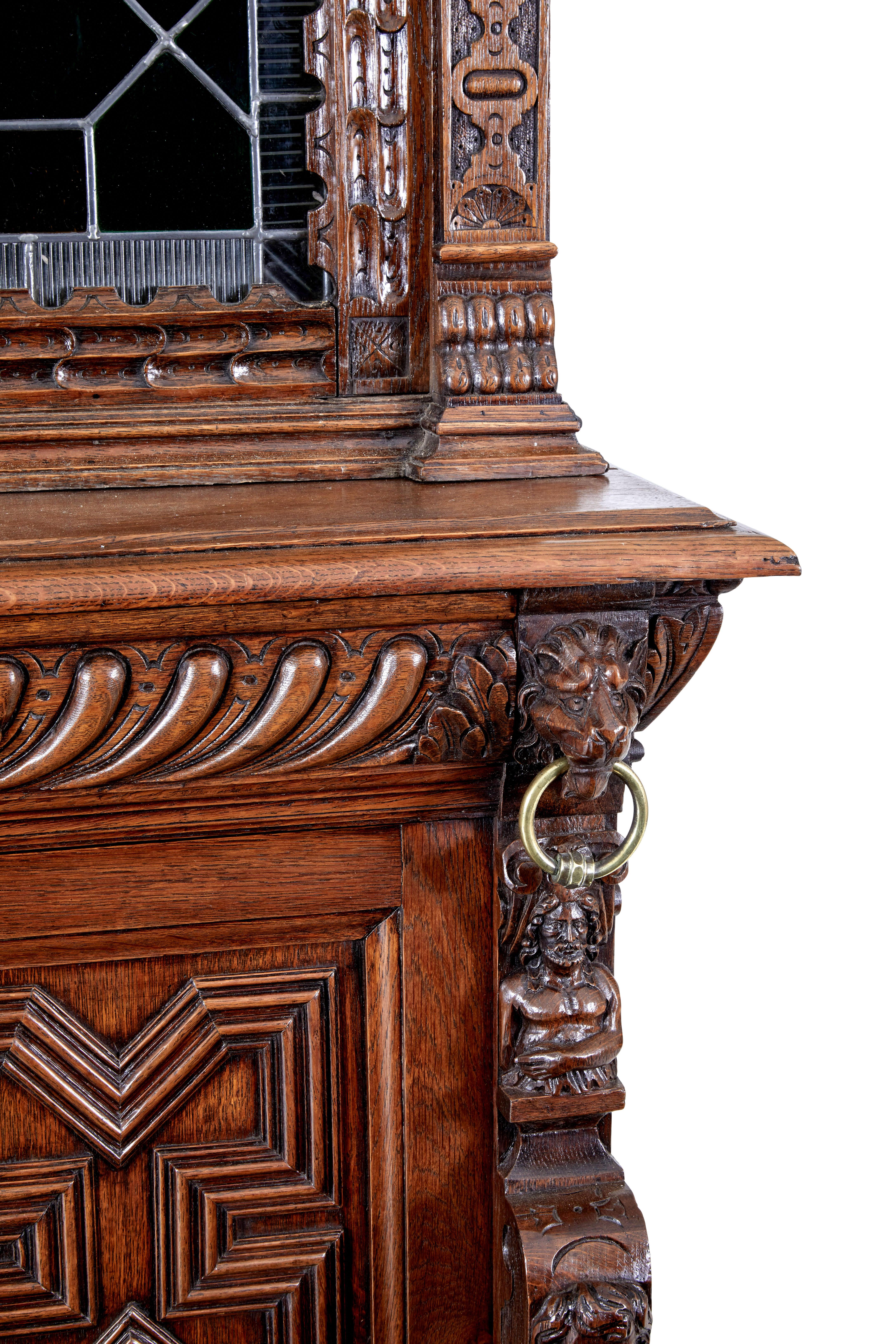 Hand-Carved 19th century Flemish oak and stain glass cabinet For Sale