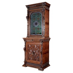 19th century Flemish oak and stain glass cabinet