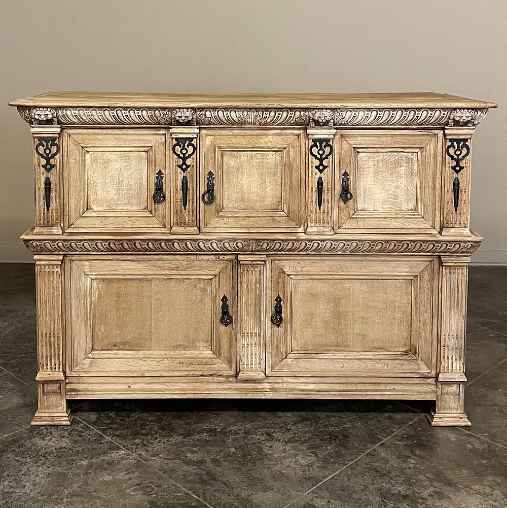 19th Century Flemish Renaissance cabinet ~ buffet is the ideal choice for those needing a little stylish storage! Hand-crafted from solid oak and fitted with steel pulls, it is separated into two distinct tiers. The upper tier, crowned with a fully