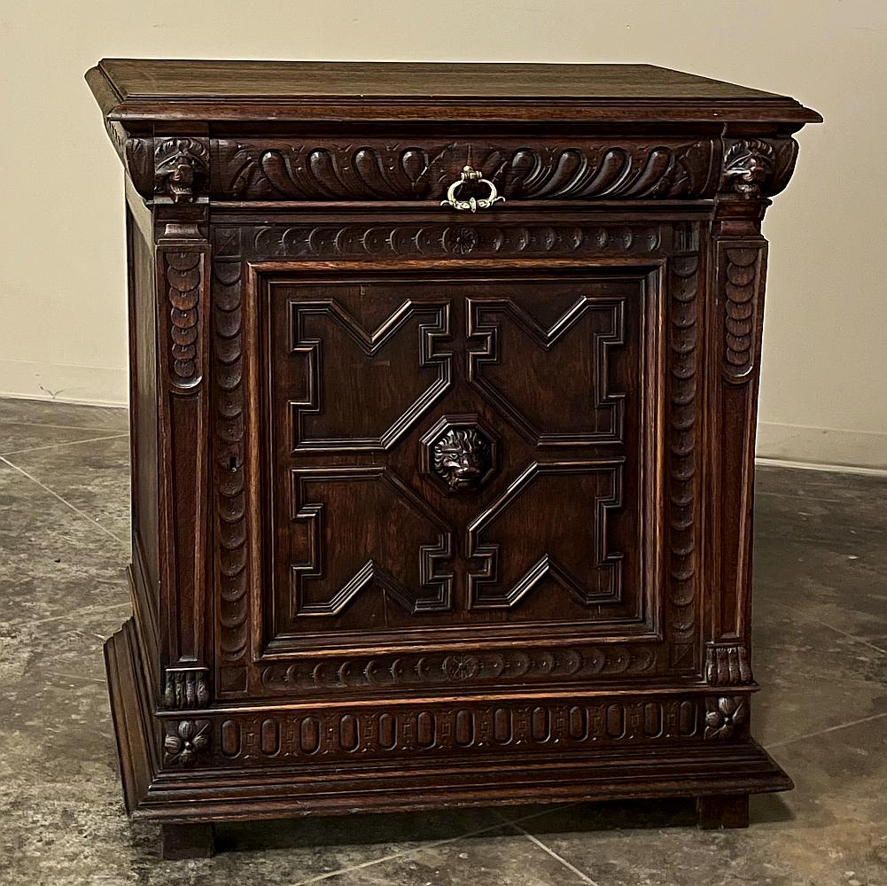 19th century Flemish Renaissance Confiturier ~ Cabinet hails from the Antwerp region, and exhibits the definitive combination of geometric forms with Renaissance-inspired carved detail set with the constraints of neoclassical architecture. The