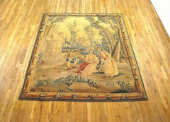 19th Century Flemish Rustic Tapestry, with Villagers Holding a Birdcage
