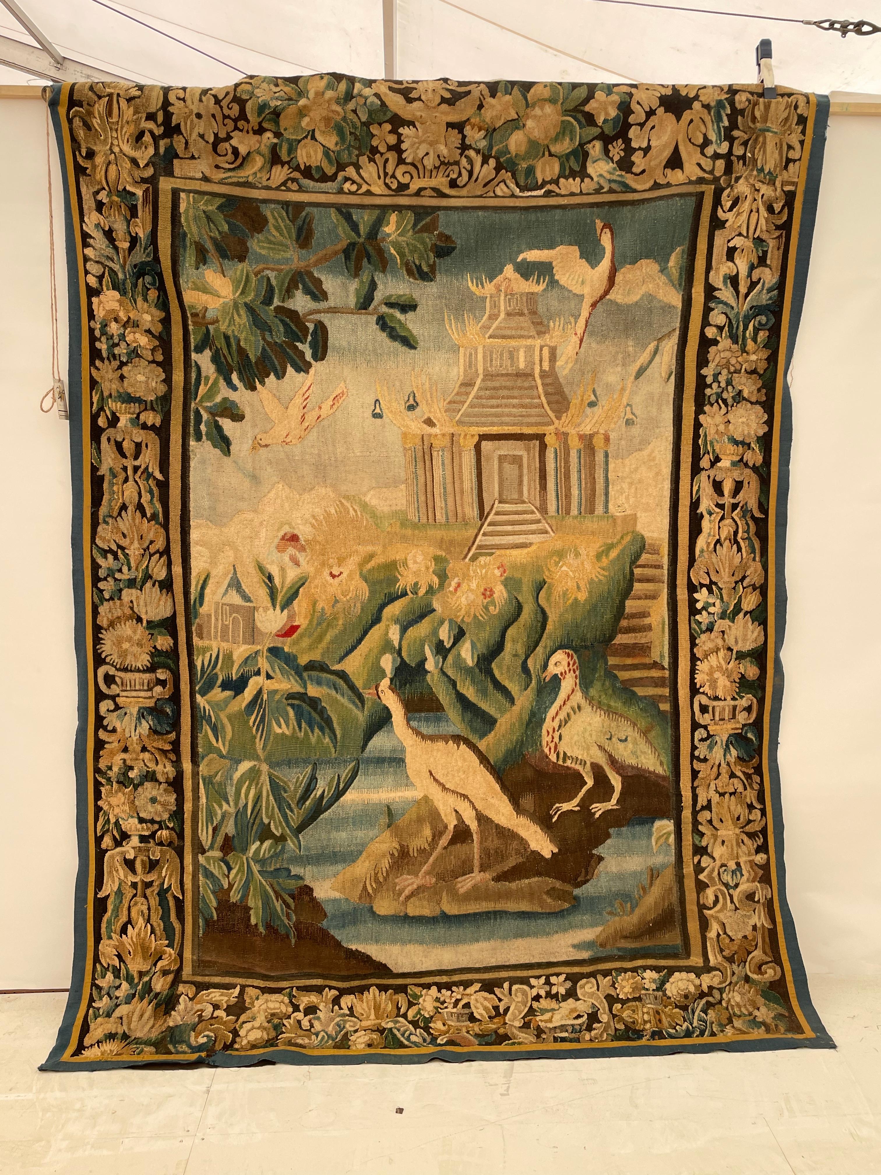 Beautiful 19th Century Flemish Tapestry. Purchased in Italy and is ready for its new home. Carries gold, green, brown, red, teal blue and more colors. Perfect for any home and space. This piece can be tacked on to the wall or repaired to hold rings