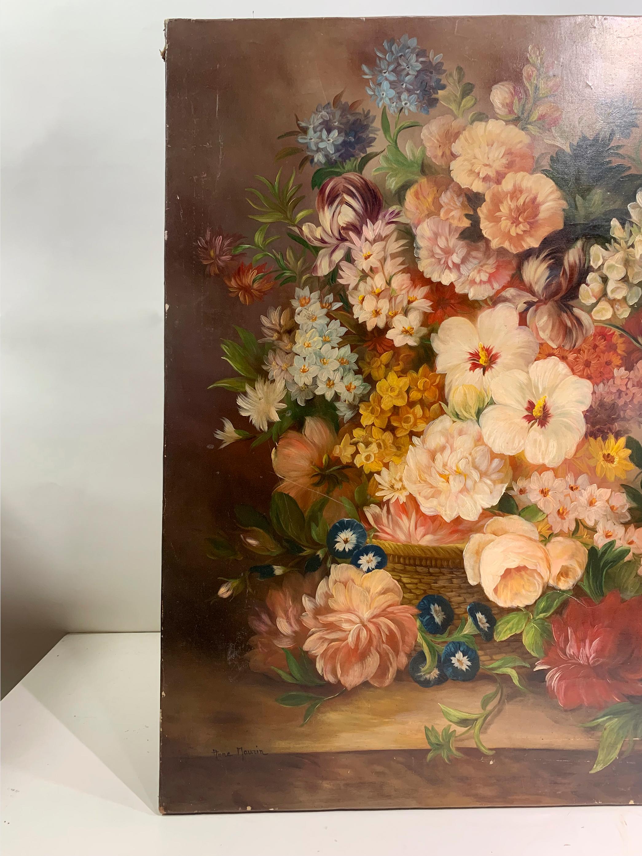 A floral painting, signed Anne Maurin at the bottom left corner, from the 19th century, typical of the period's Romantic and Realist styles, depicting a lush bouquet of flowers arranged in a basket. 
The painting features a variety of blooms such as