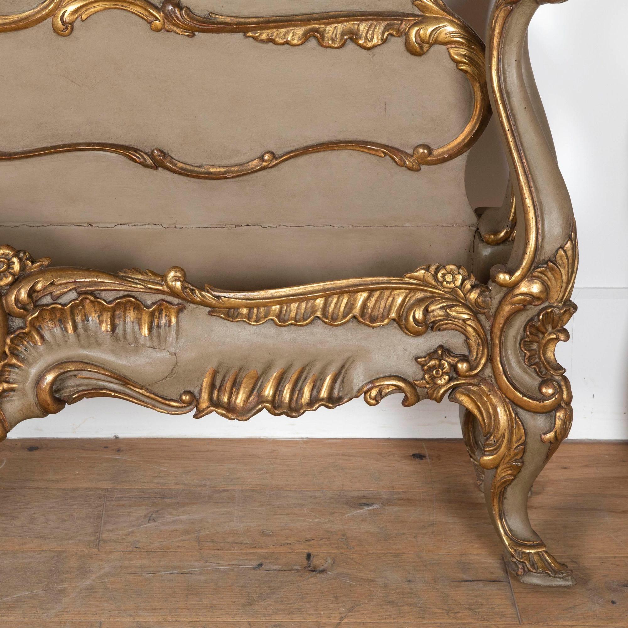 
Magnificent 19th Century Florentine Baroque giltwood super king size bedstead.
Beautiful hand carving with original gilding.
Pair of angels on the top of the headboard to watch over you while you sleep, with original hand-painted faces.
The bed