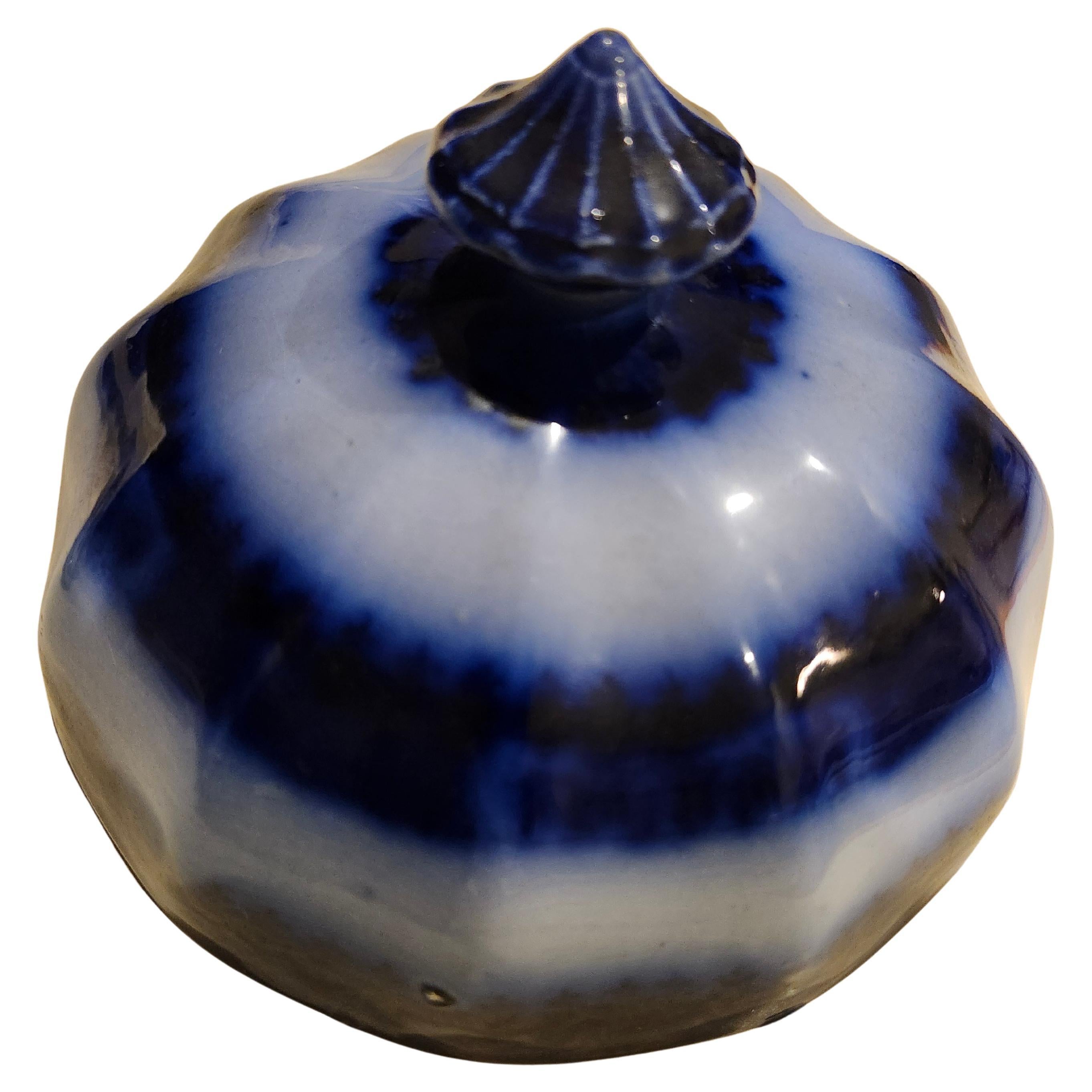 Fabulous 3 piece flow blue round butter dish with handled lid and ice separater.  In excellent antique condition with minimal,  almost no wear. Priced and sold as a three piece set.