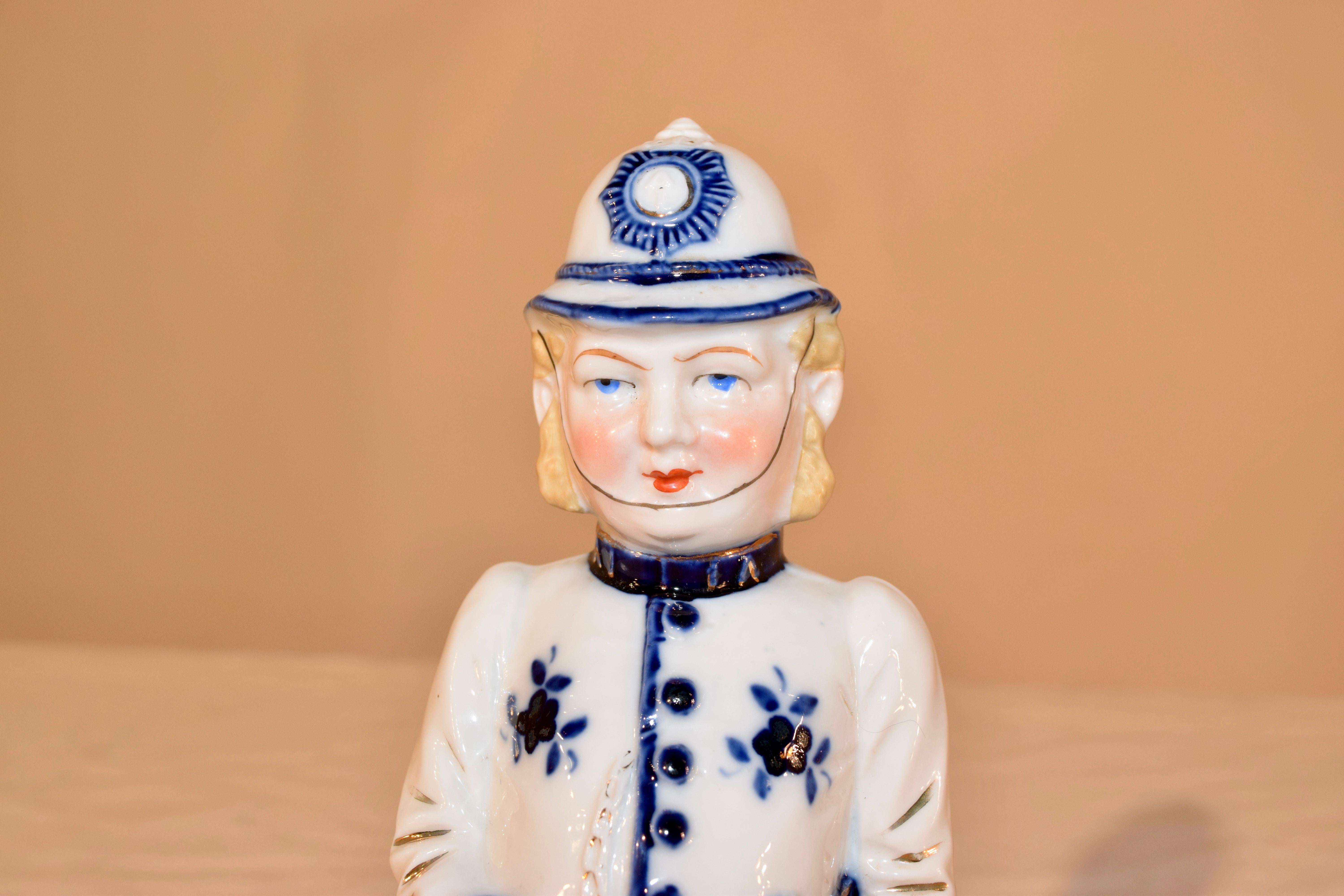 19th century flow blue figure of an English policeman or 